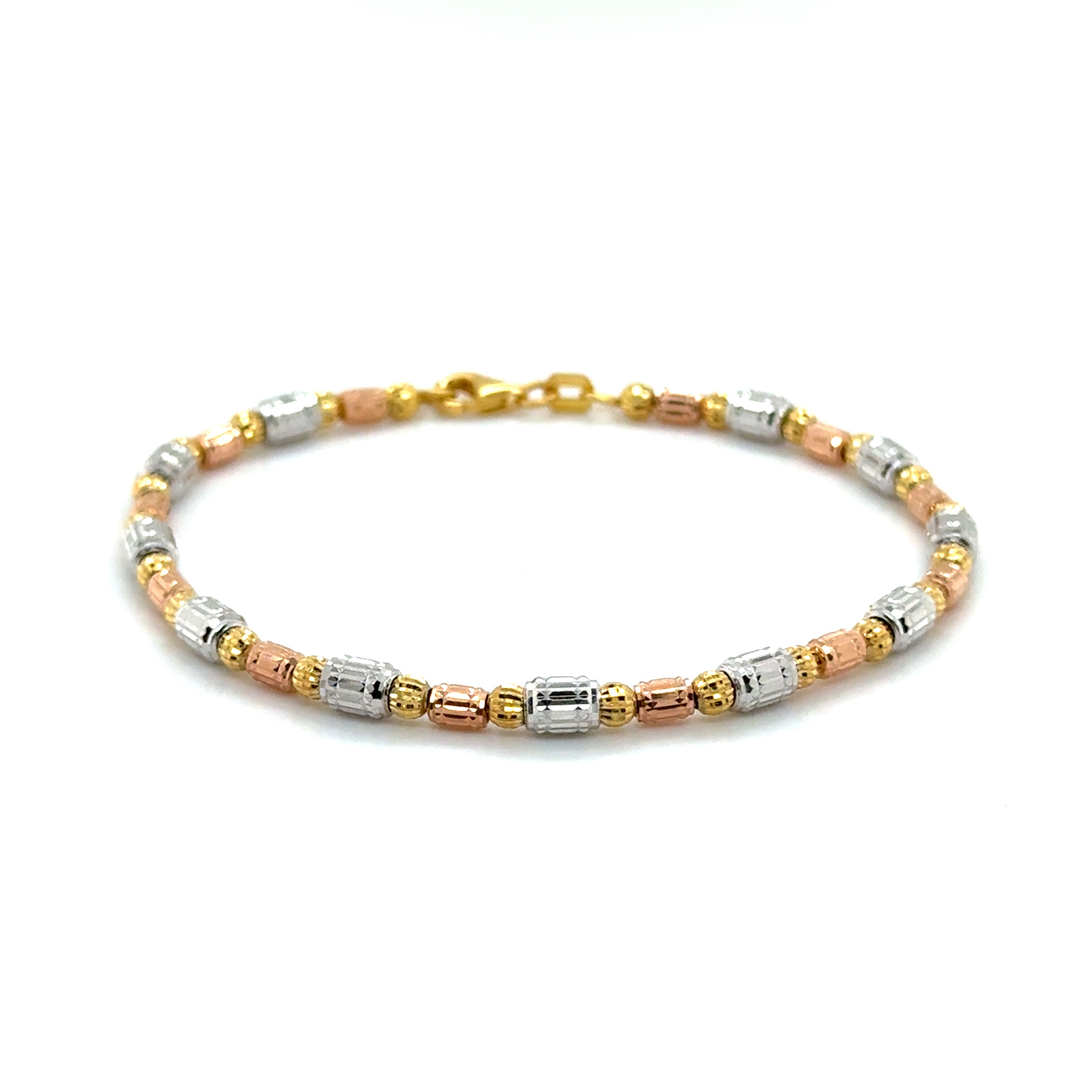 14K Tricolor Gold Barrel Bead Jewelry designed with flexible layers of gold beads and natural diamonds, finished with a secure lobster clasp for a reliable and stylish look.