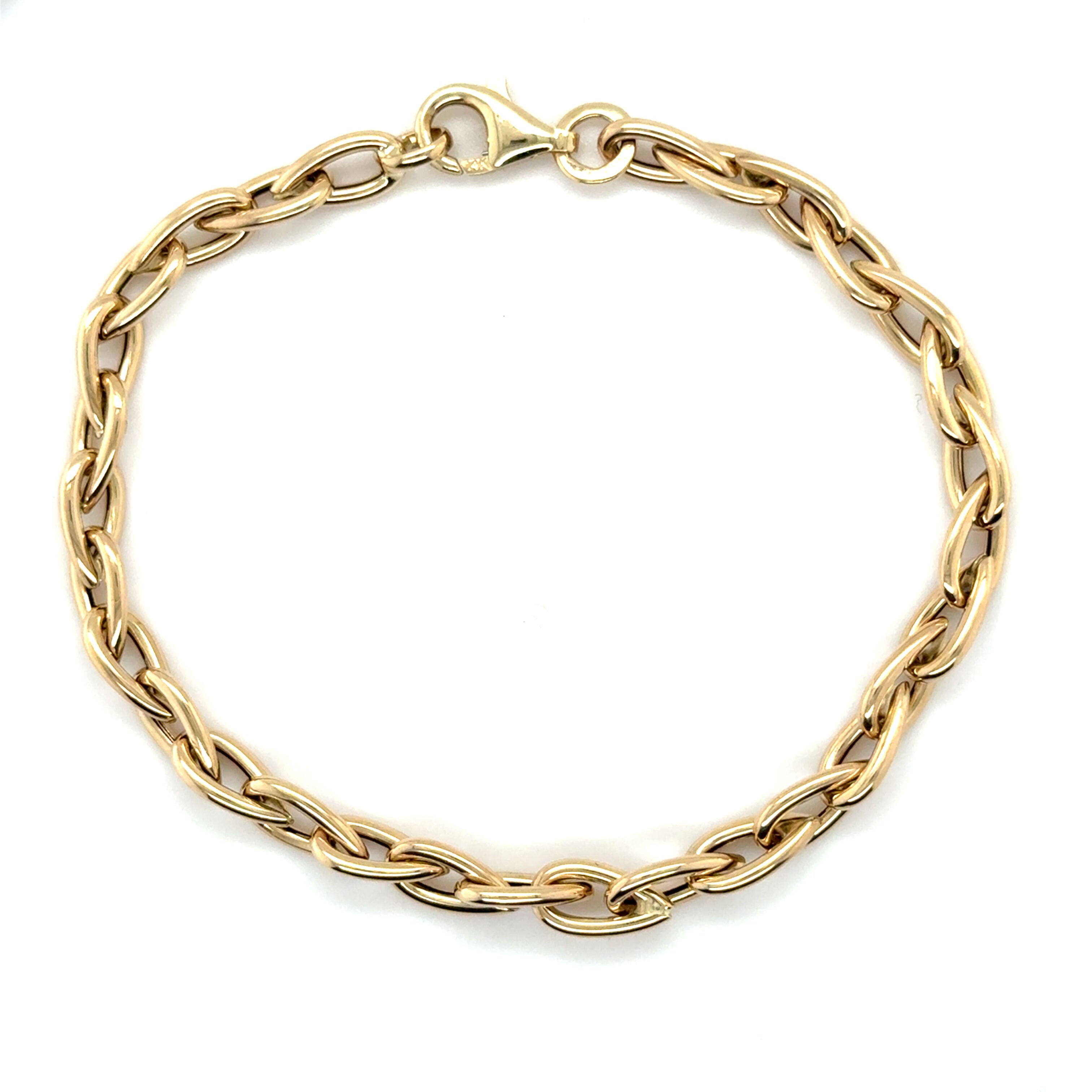 This 14K Yellow Gold Pear-Shaped Link Bracelet features unique pear-shaped links crafted from solid gold for lasting shine.