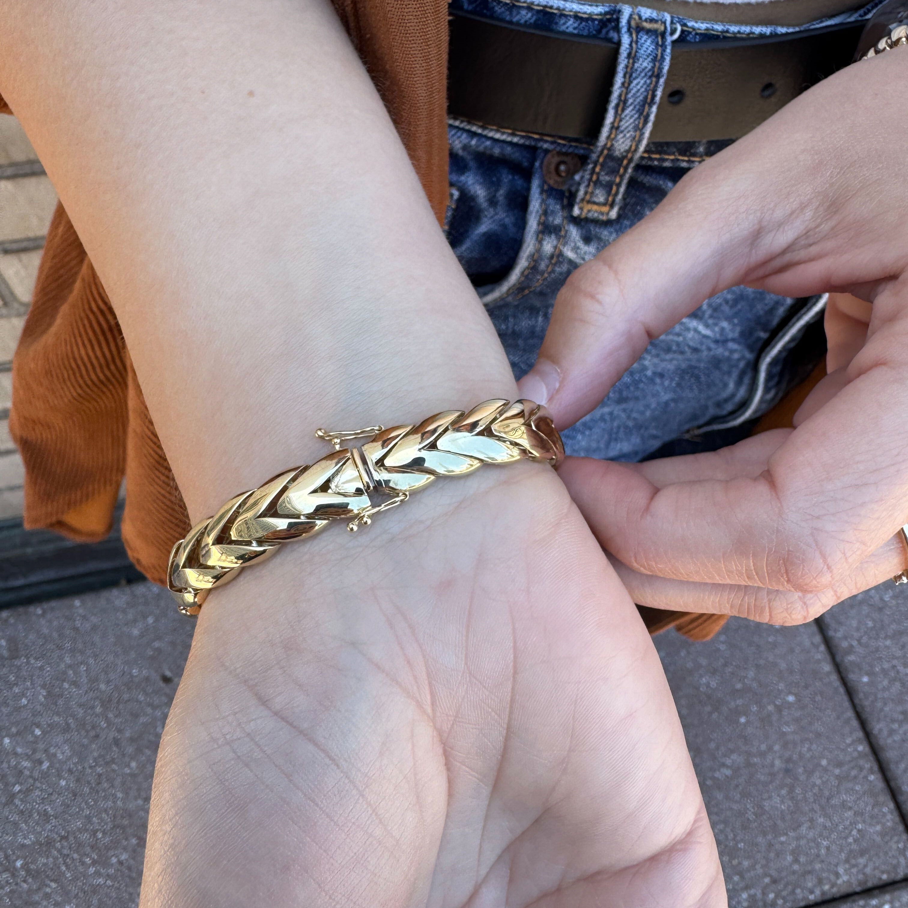 14K Gold V-Shape Bracelet styled with neutral basics and minimal rings, great for making a strong style statement with ease