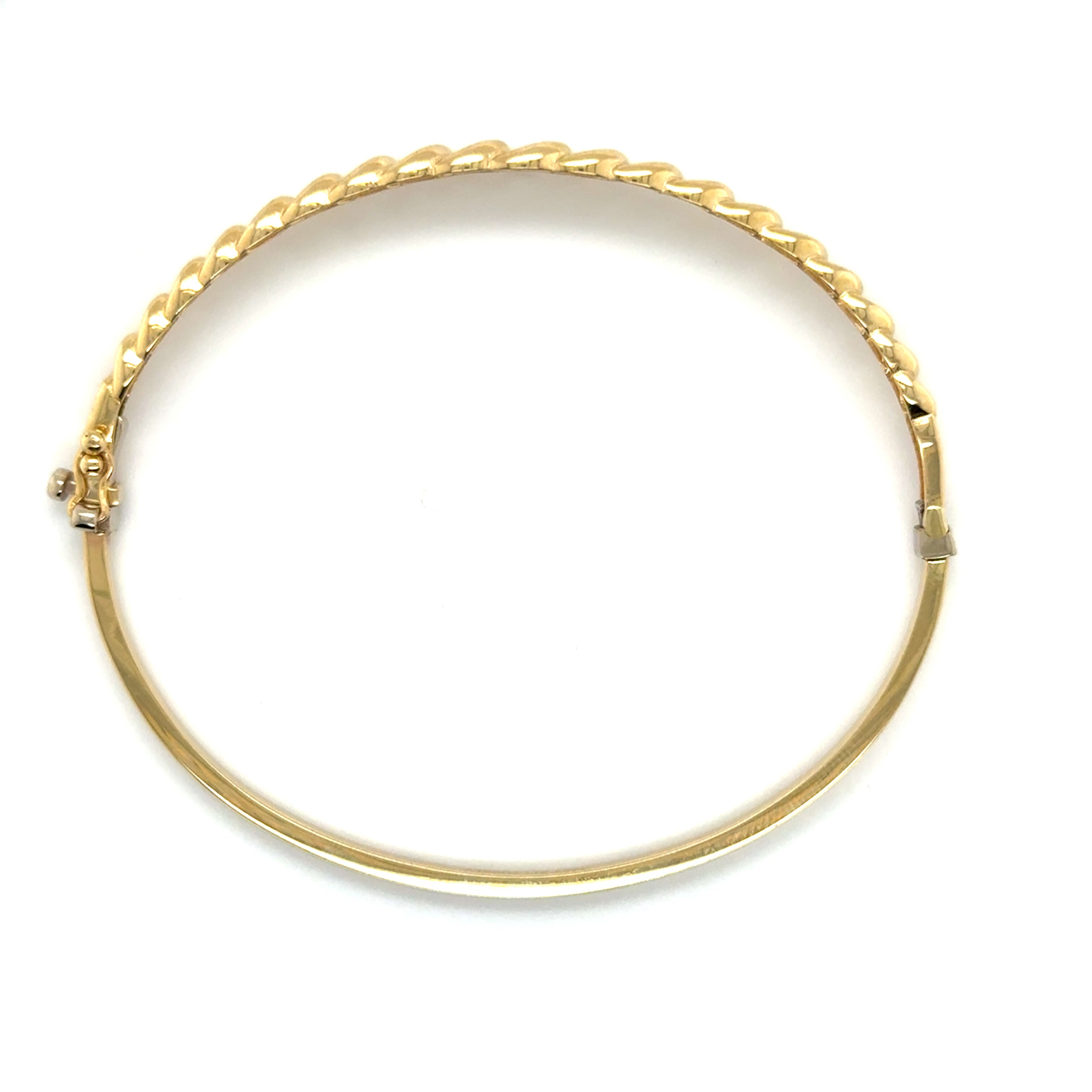 Chunky 14K Yellow Gold Curb Bangle that brings a strong, polished finish to casual and elevated looks.