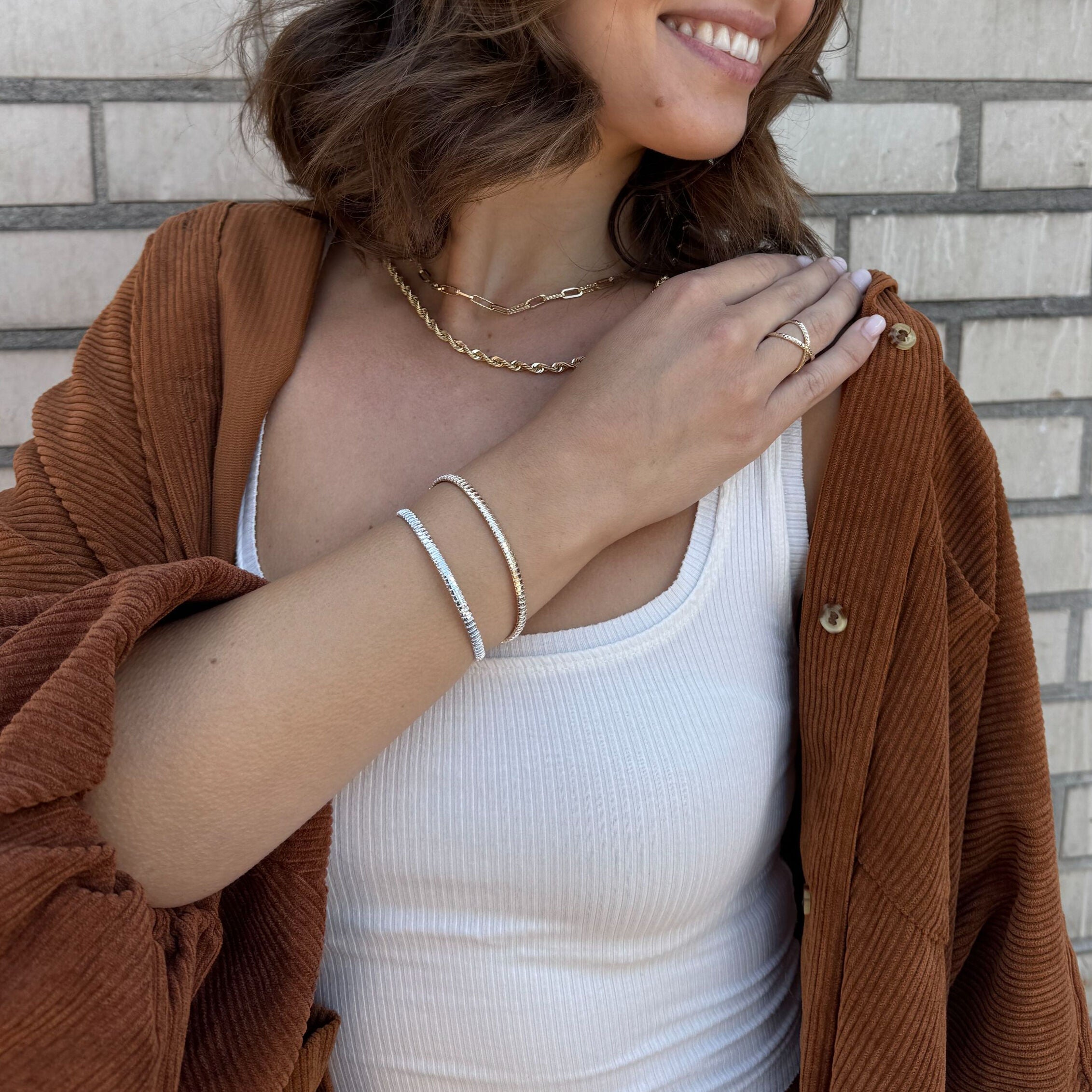Curved link bracelet in 14K gold with polished finish for timeless appeal.