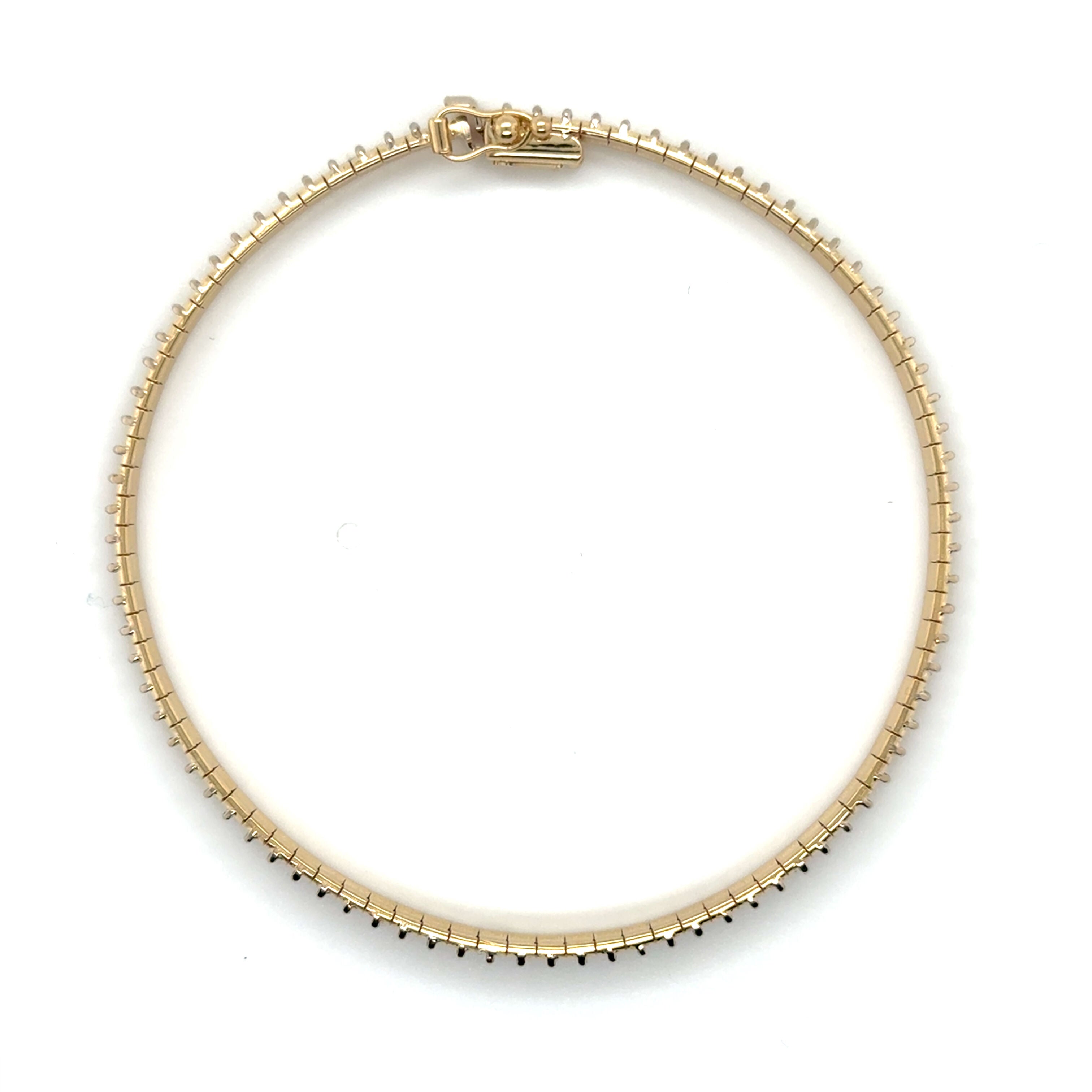 14K gold bracelet with safety clasp for secure fit and eye-catching shine.