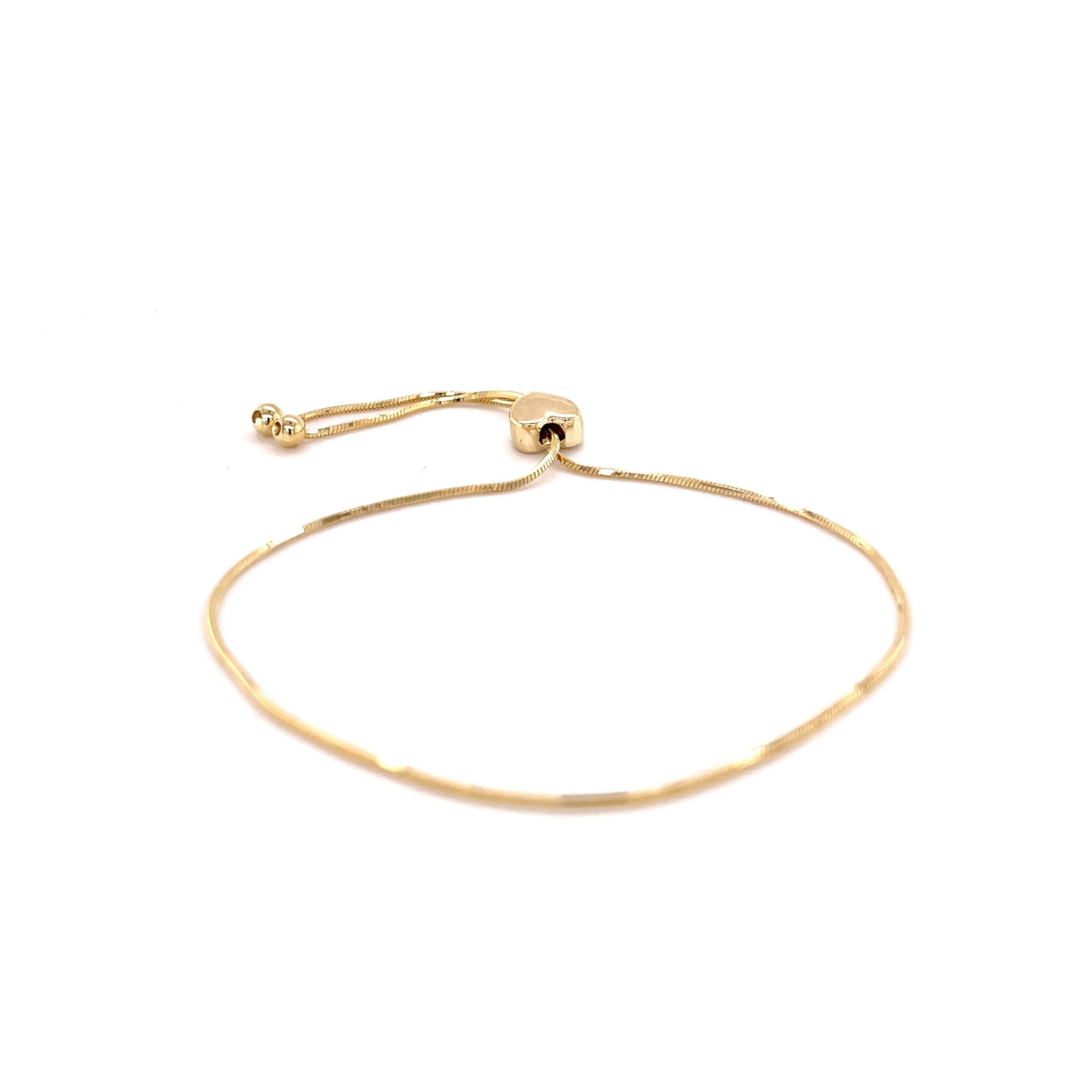Minimalist Heart Bracelet in 14K gold, ideal for soft layering and quiet elegance