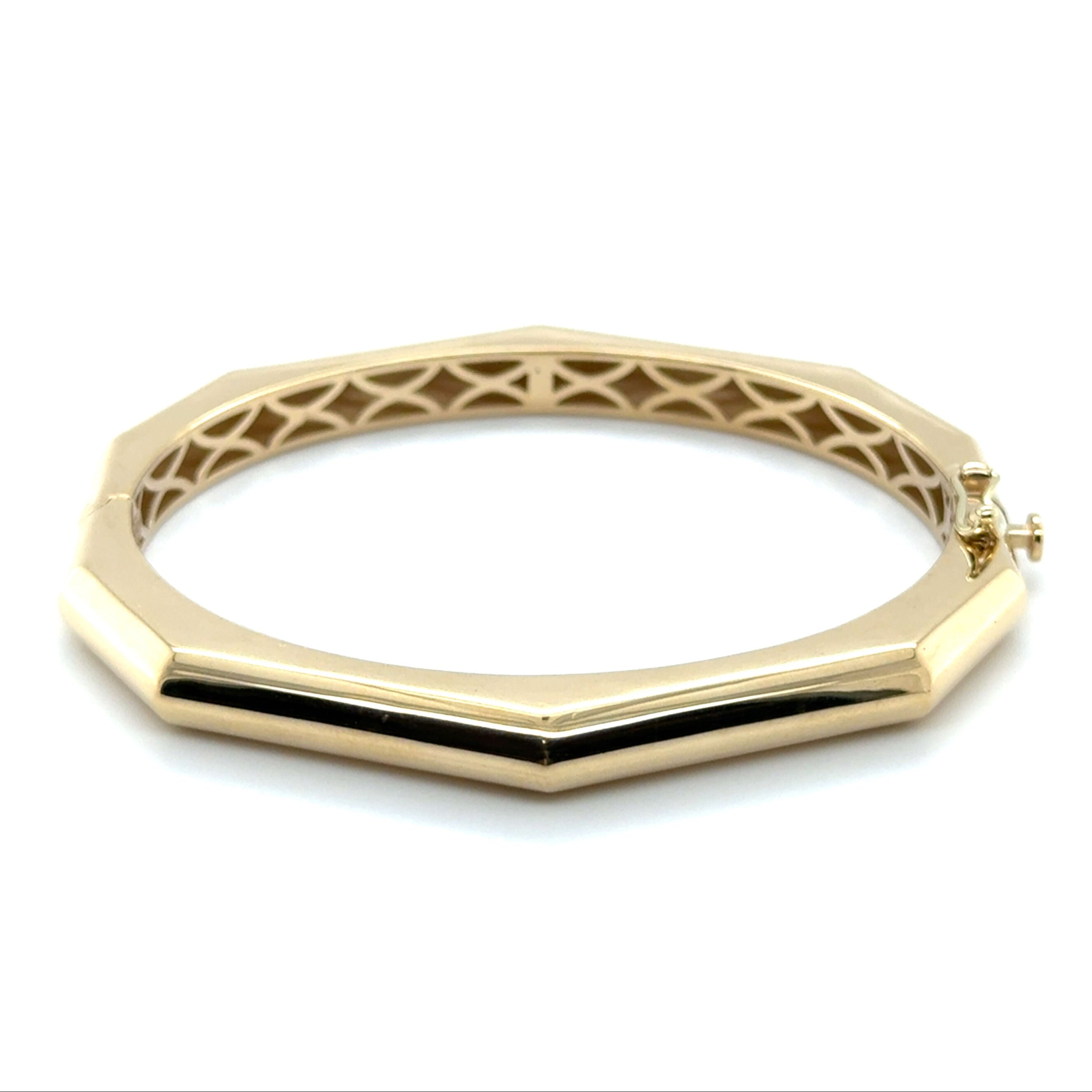 14K Gold Octagonal Bangle features a unique geometric shape that adds modern flair to any outfit, offering a bold yet timeless edge perfect for daily wear or formal looks, and makes a thoughtful gift for birthdays or milestones.
