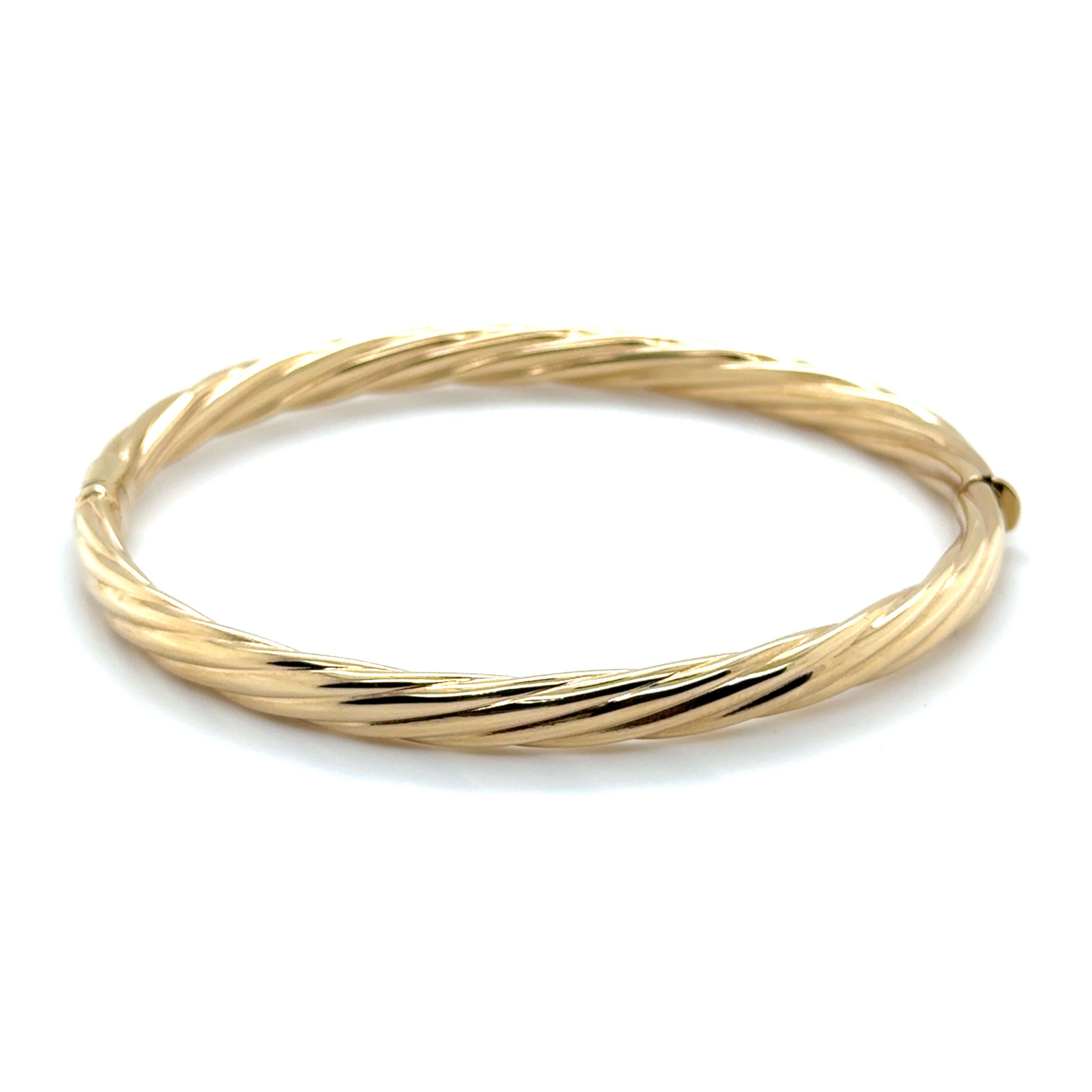 14K gold 5mm twisted bangle bracelet showcasing its elegant woven texture and high-polish finish.