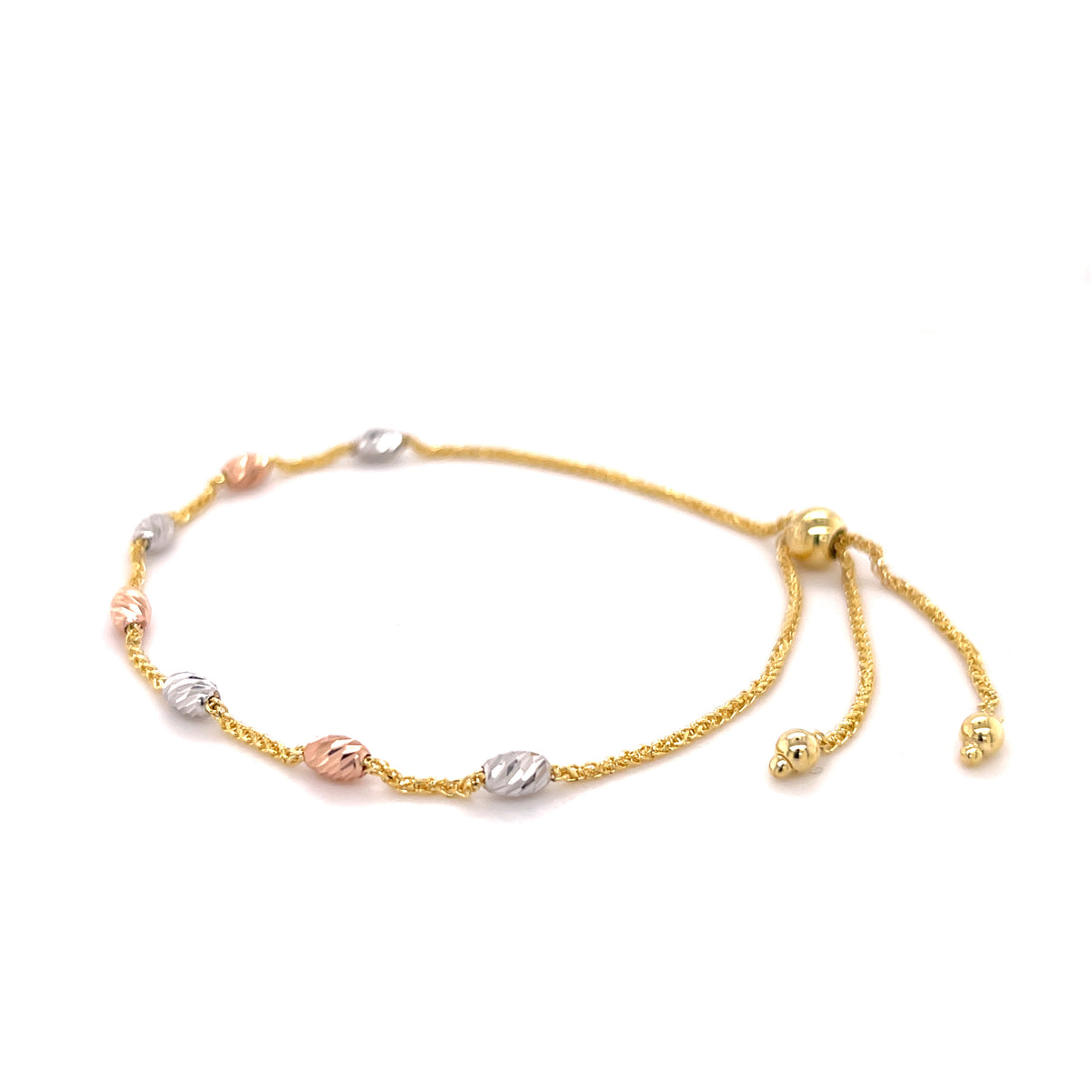 14K tricolor gold beaded friendship bracelet with diamond-cut sparkle, laid flat on white, adjustable up to 9.25 inches