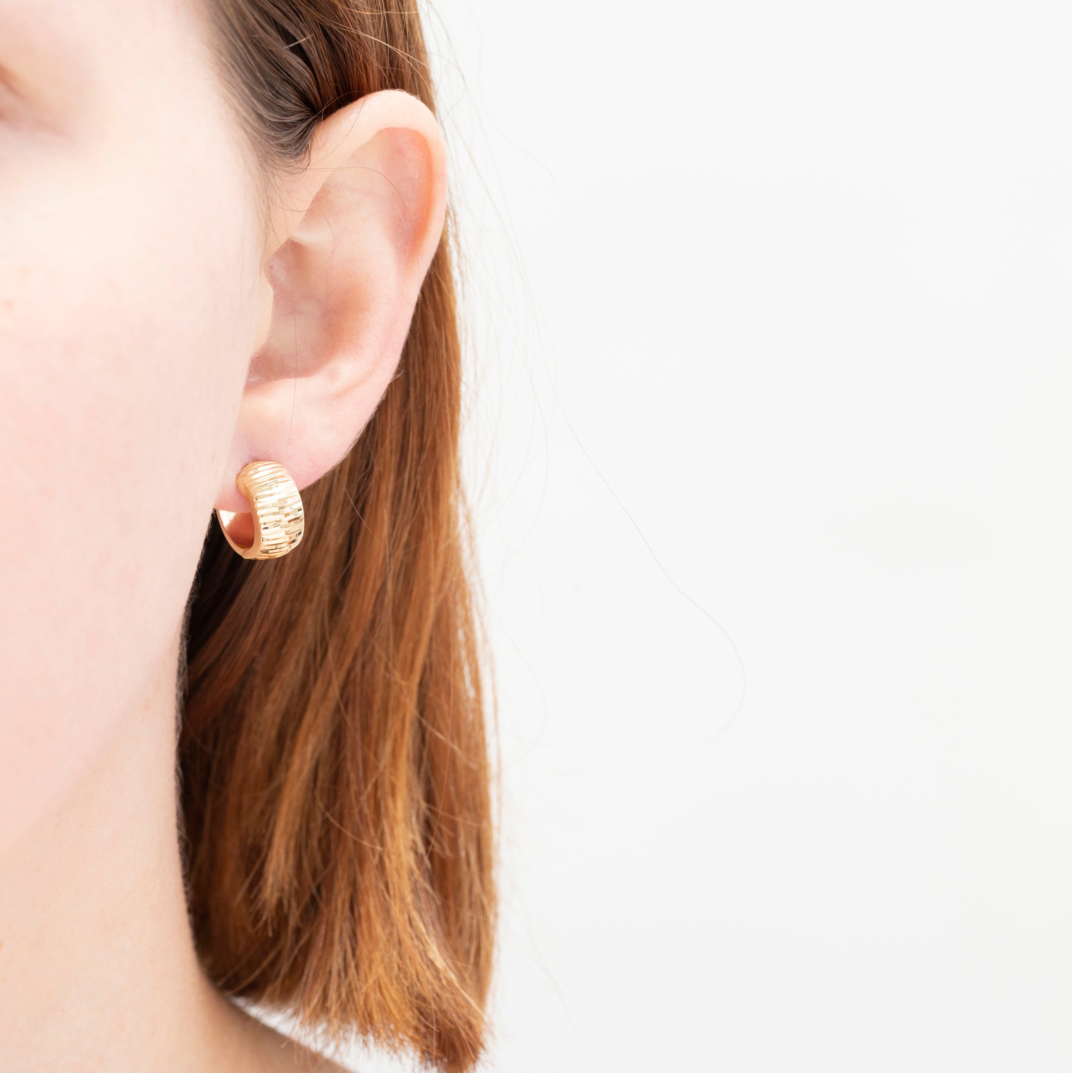 14K Gold Polished And Textured Huggie Earrings