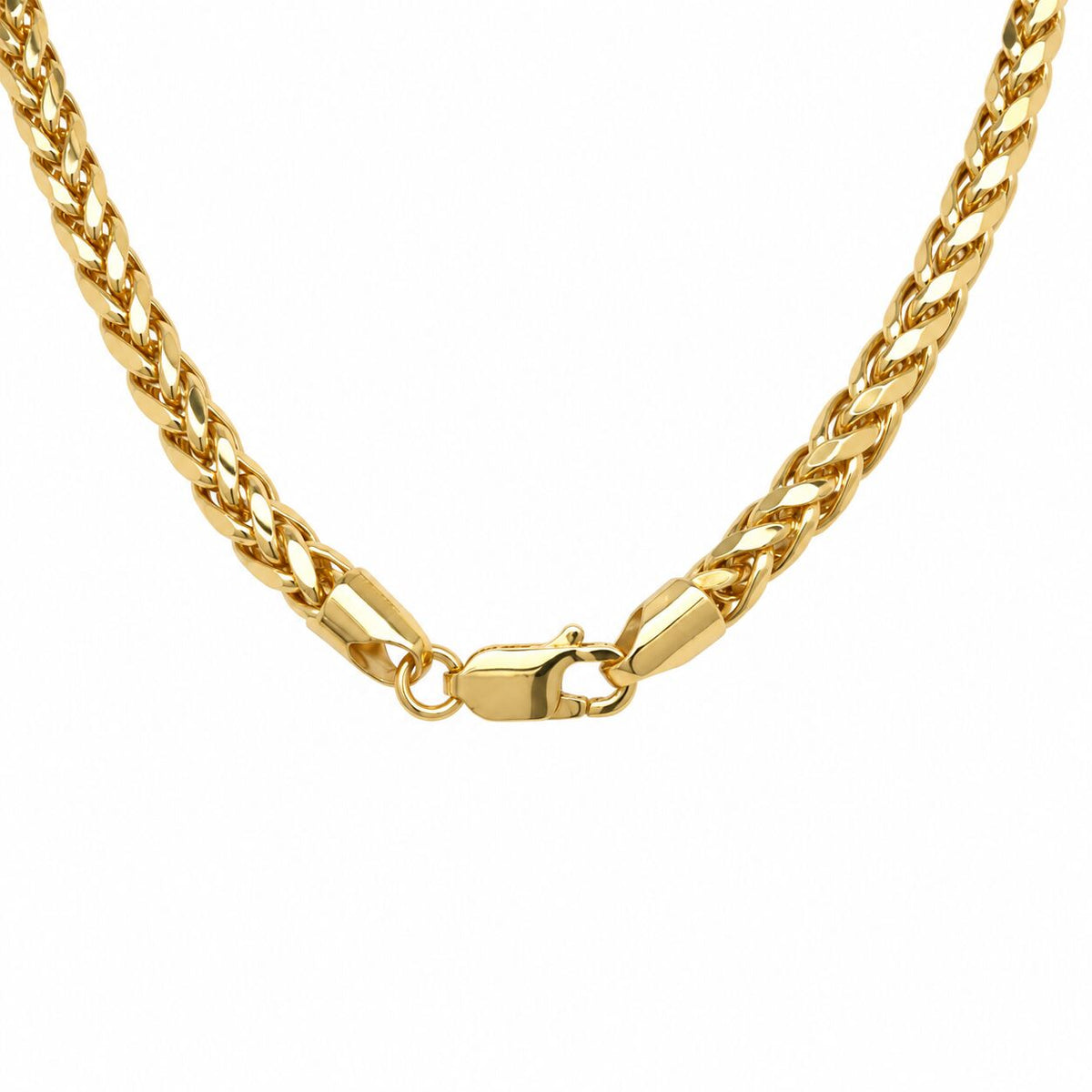 14K yellow gold round wheat chain with diamond-cut finish and lobster clasp shown against dark fabric, facets sparkling