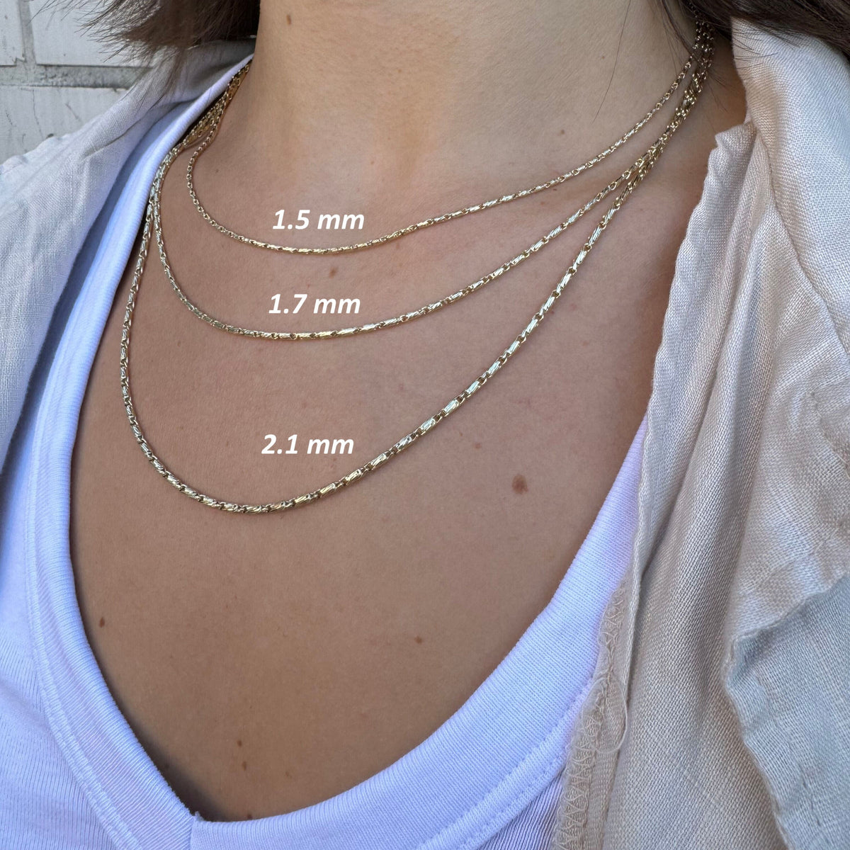 14K Yellow Gold Twisted Lumina Bar Link Necklace, Available in 1.5mm, 1.7mm and 2.1mm widths, with lengths from 18" to 24". The necklace is finished with a secure lobster clasp and also looks great layered with other gold chains.