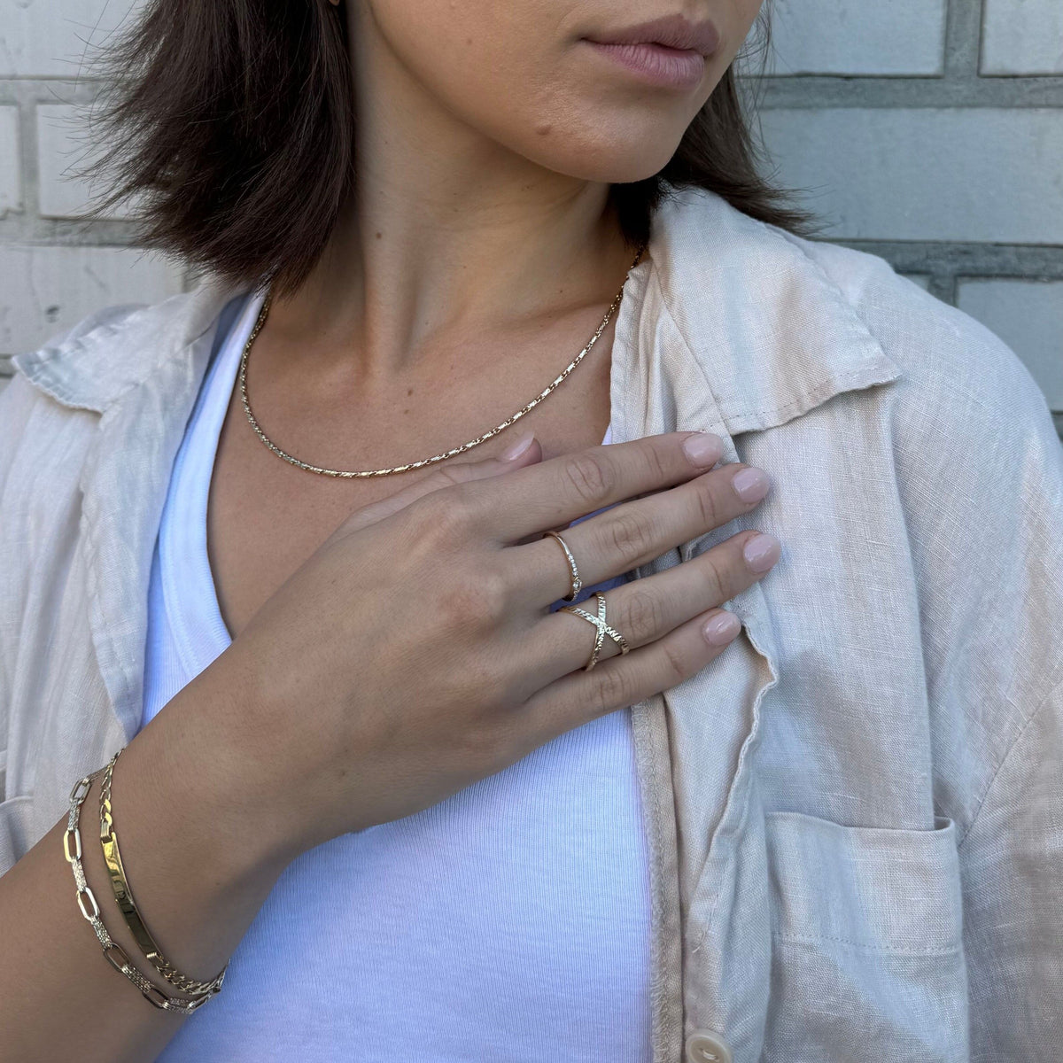 14K Yellow Gold Twisted Lumina Bar Link Necklace, Available in 1.5mm, 1.7mm and 2.1mm widths, with lengths from 18" to 24". The necklace is finished with a secure lobster clasp and also looks great layered with other gold chains.