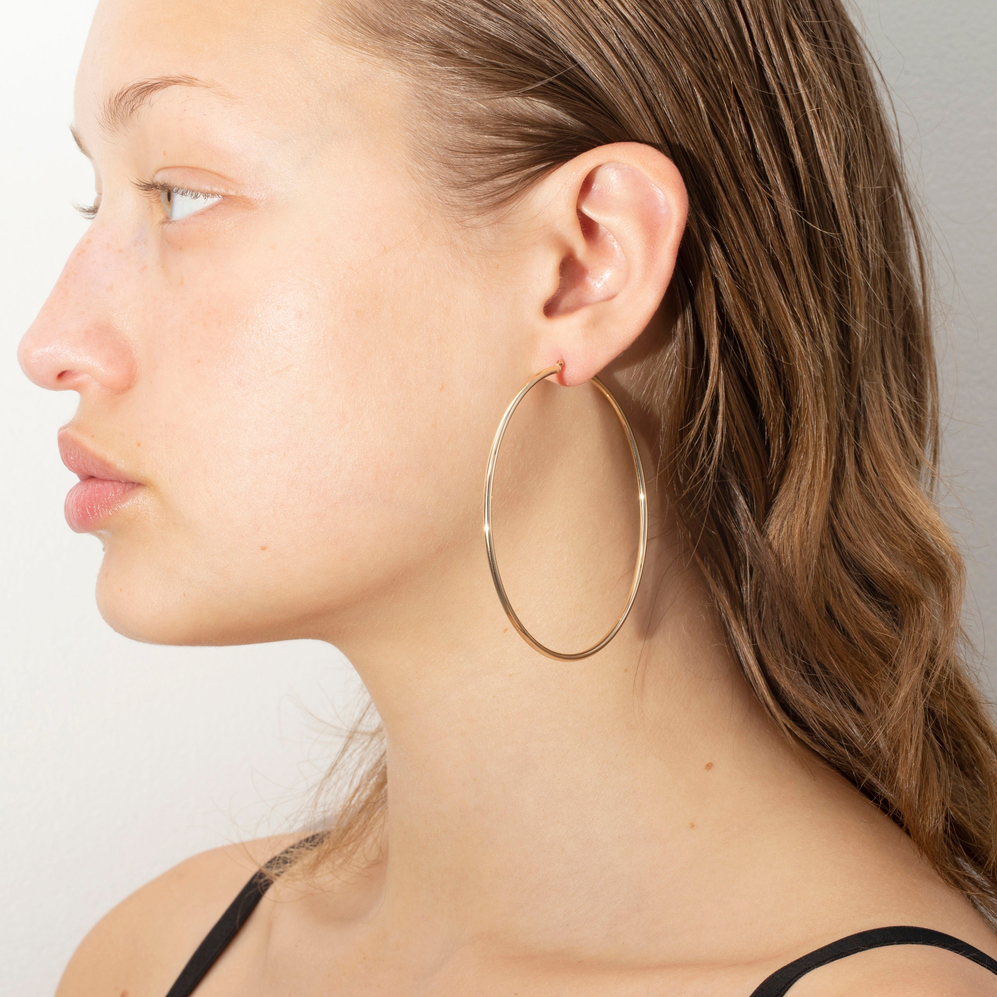 14K Gold Large polished 70 mm Thin Hoops