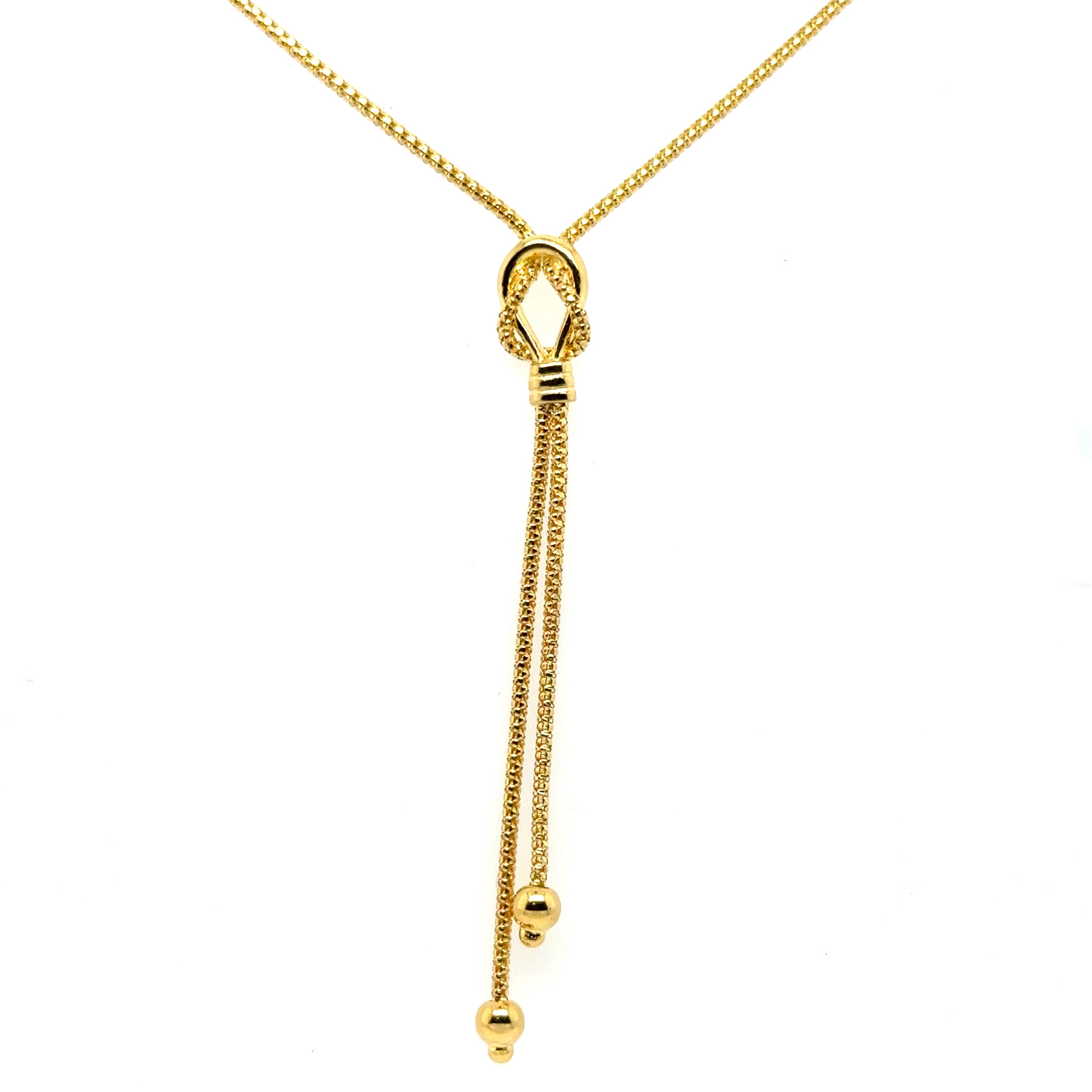 14K Gold Knot Lariat Necklace. Made of real gold, resistant to tarnish and water.