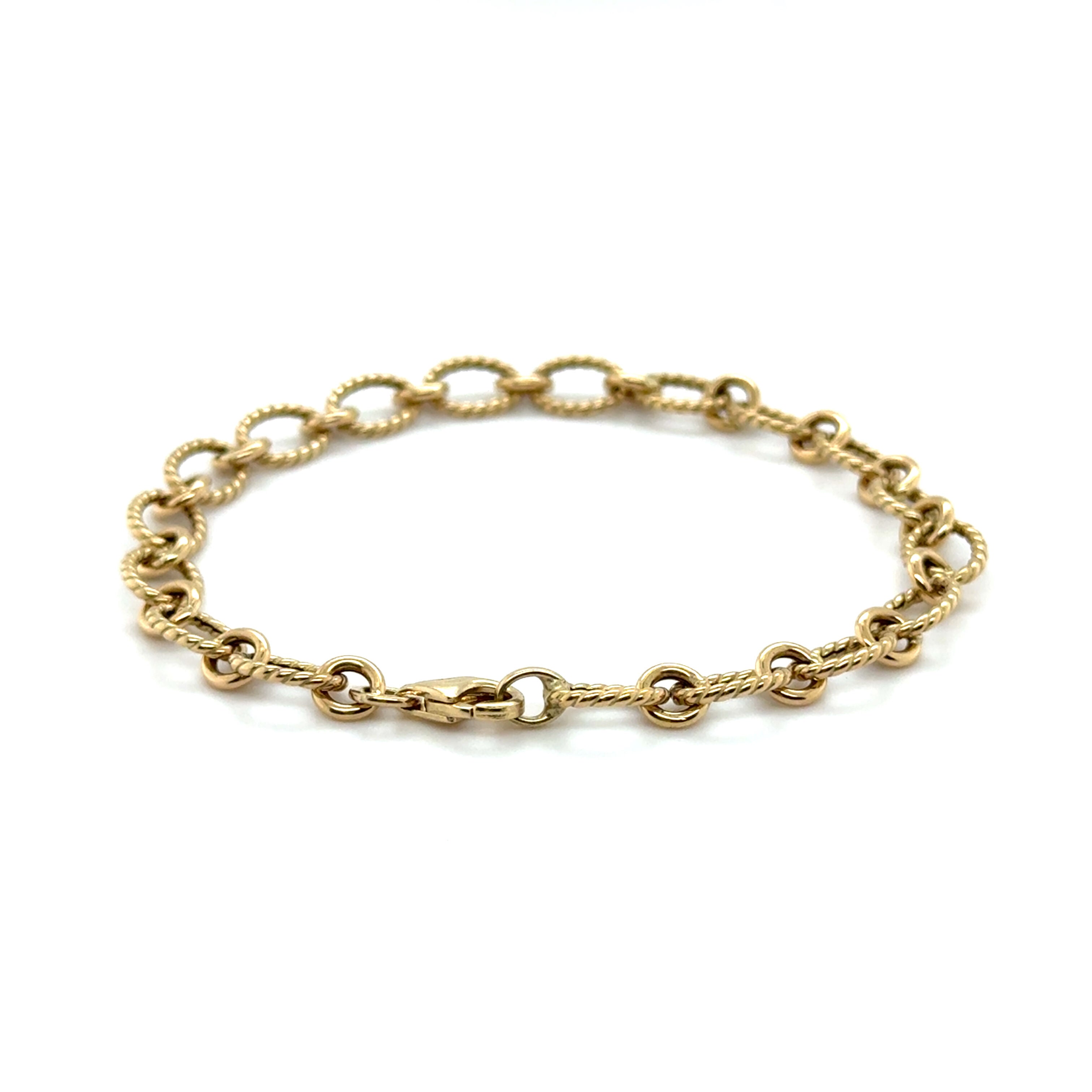 14K Gold Twisted Oval Link Chain Bracelet: 7"- Made In Italy