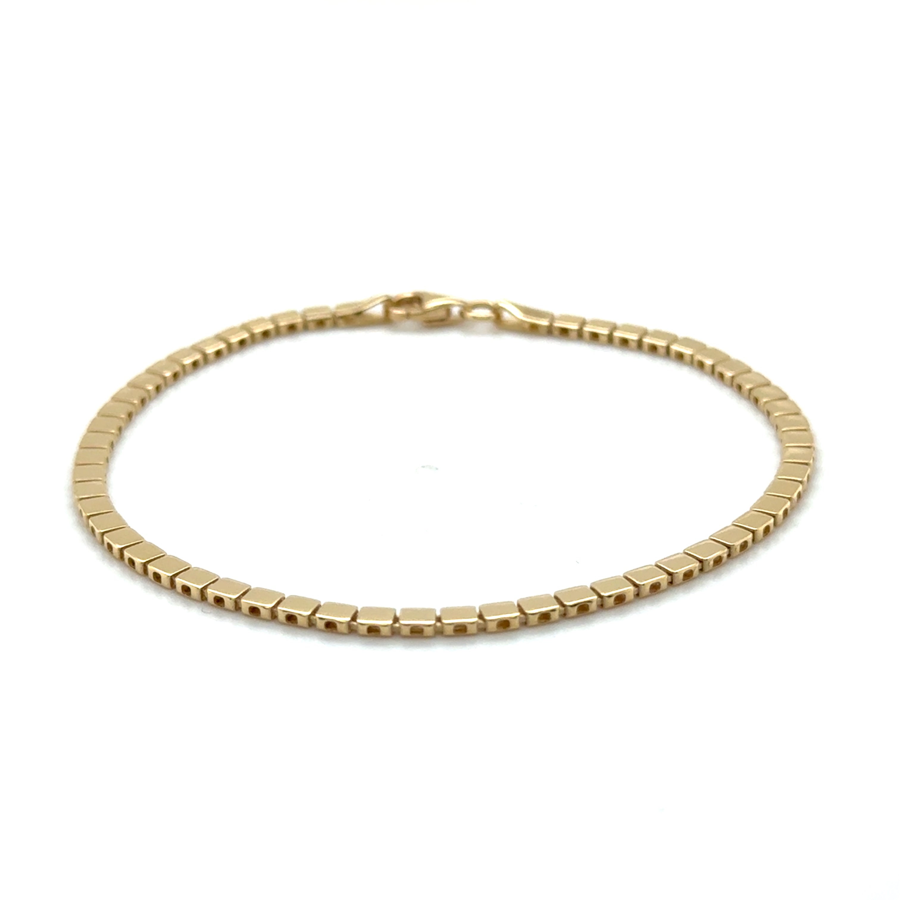 A timeless and elegant gold chain bracelet with box links, perfect for everyday wear or special occasions. This durable and versatile bracelet is a stylish gift idea for birthdays, anniversaries, or milestone celebrations.