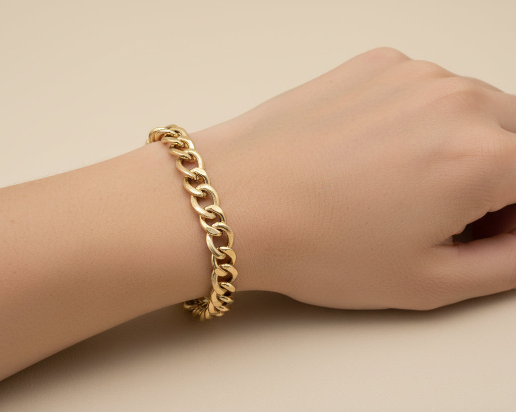 14K Gold Oval Link Bracelet: 7.25 Inch Poloshed & Textured Links