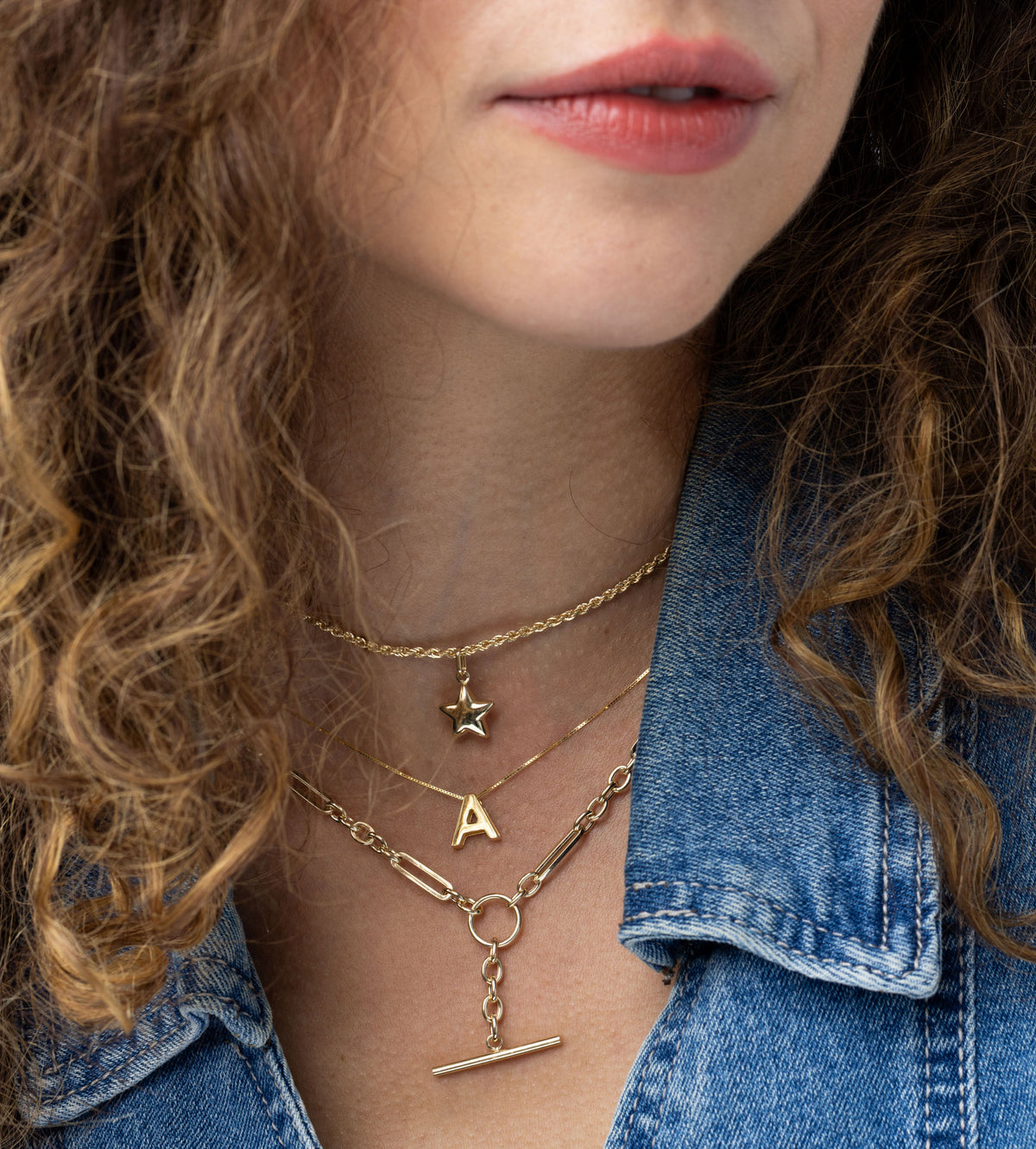 14K Yellow Gold Mixed Link T-Bar Drop Necklace, layered on model with more chains