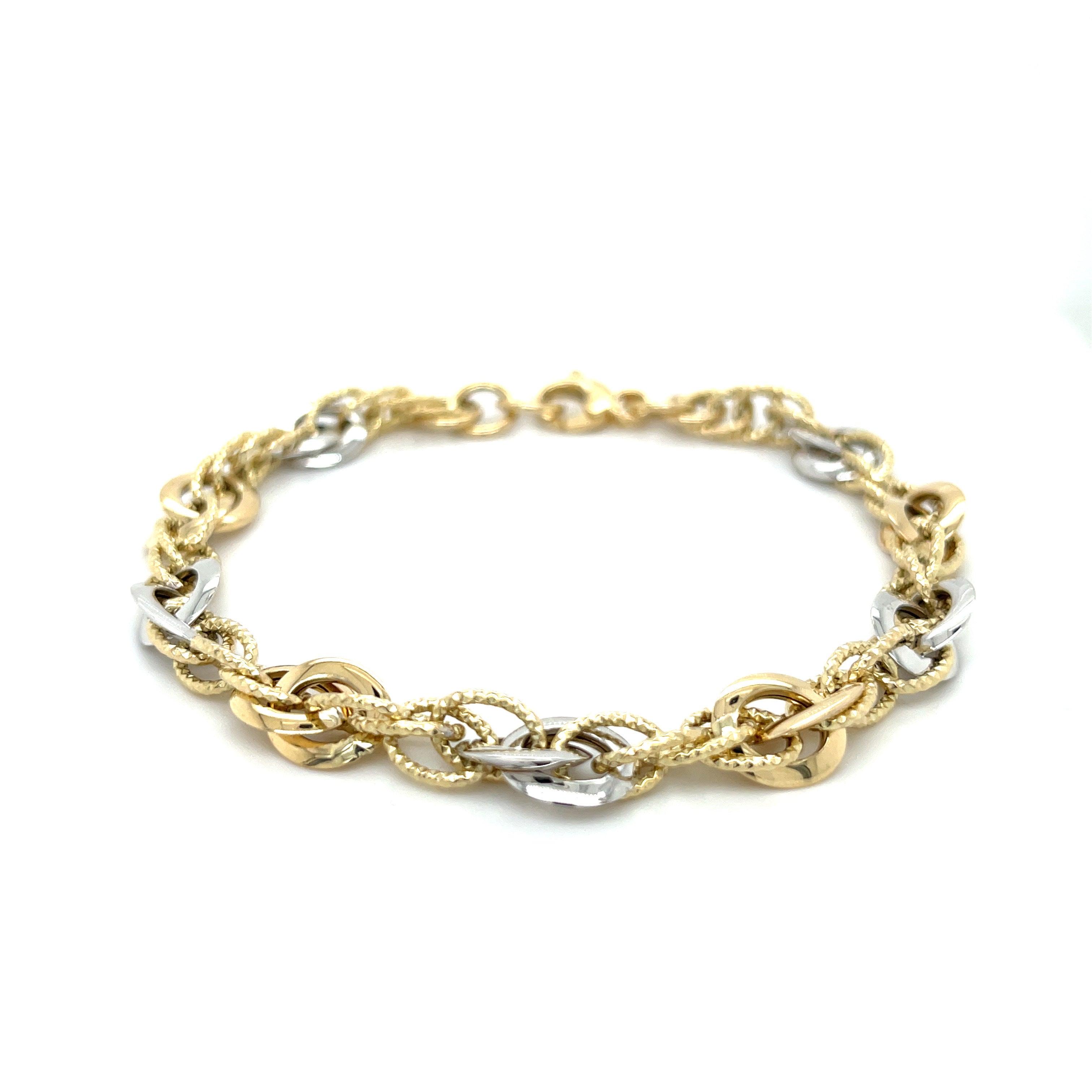 Durable 14K Two-Tone Gold Interlocking Links Bracelet designed to last with a secure lobster clasp, ideal for both casual and formal occasions.