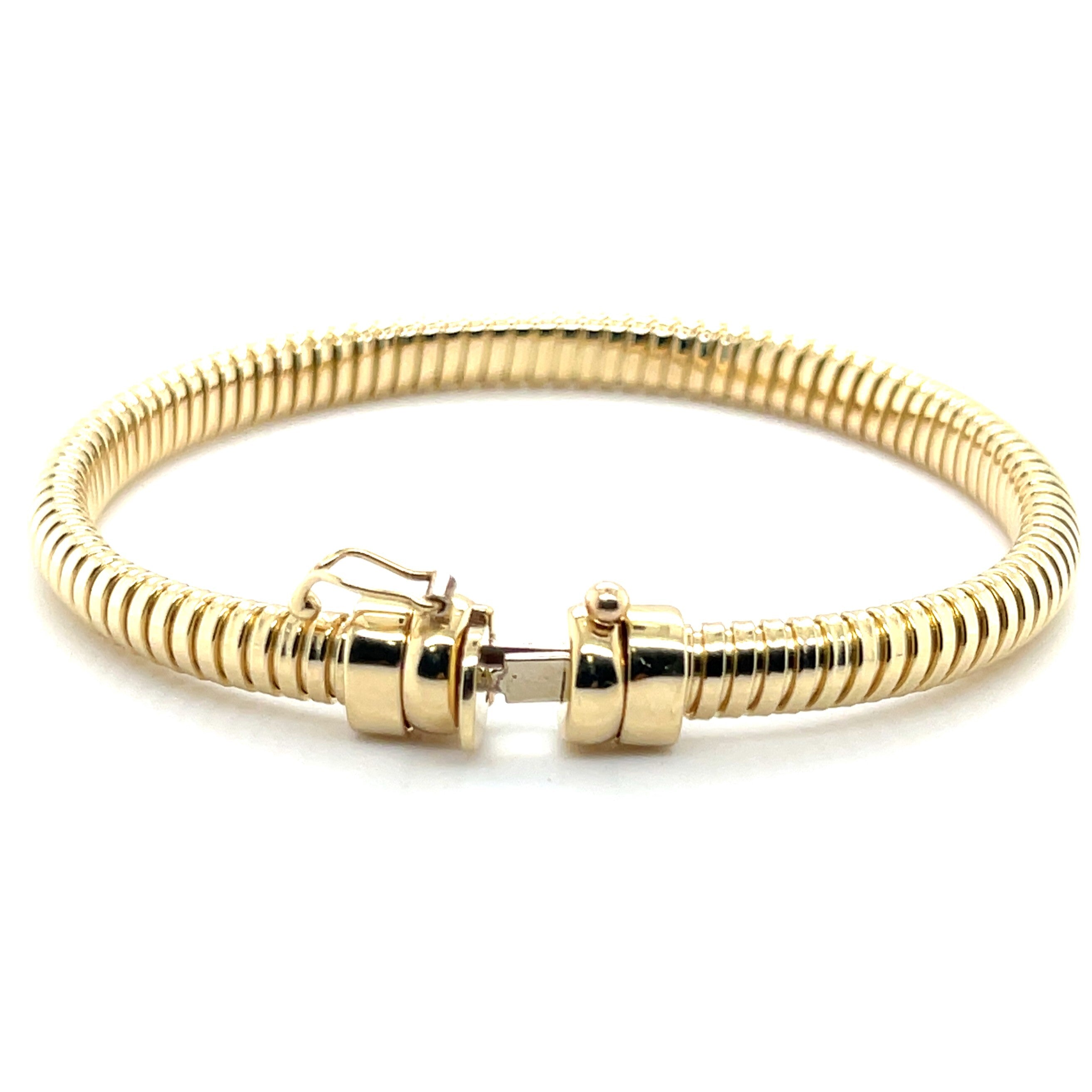 Elegant 14K yellow gold Tubogas bracelet with a polished coil design that is durable, versatile, and timeless. A luxury jewelry piece perfect for everyday wear, birthdays, anniversaries, or milestone celebrations, offering both comfort and sophistication.