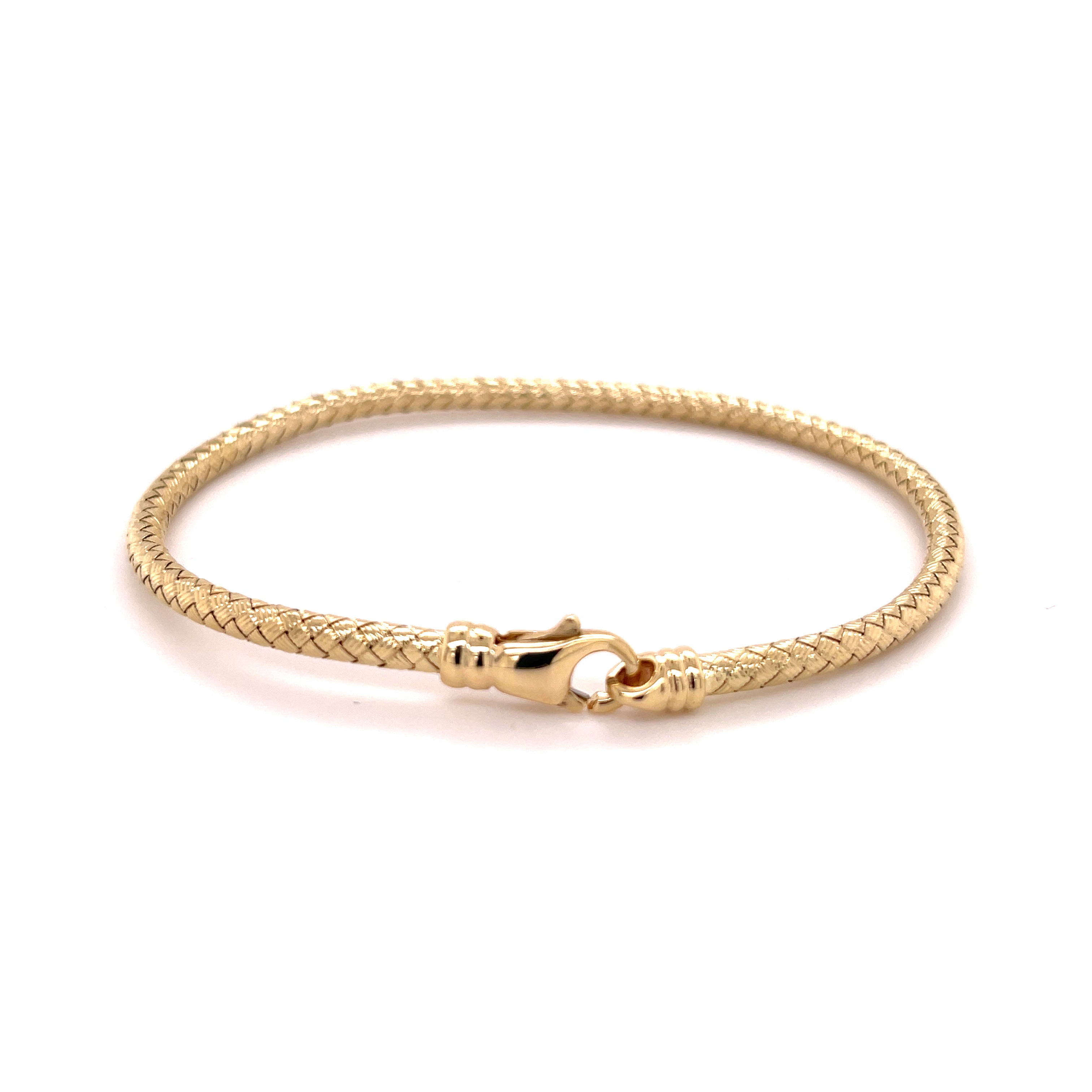 Elegant 14K yellow gold woven bangle bracelet with an intricate braided texture, offering timeless craftsmanship and lasting brilliance. Comfortable, durable, and versatile, it makes a refined fine jewelry gift for birthdays, anniversaries, weddings, and milestone celebrations.