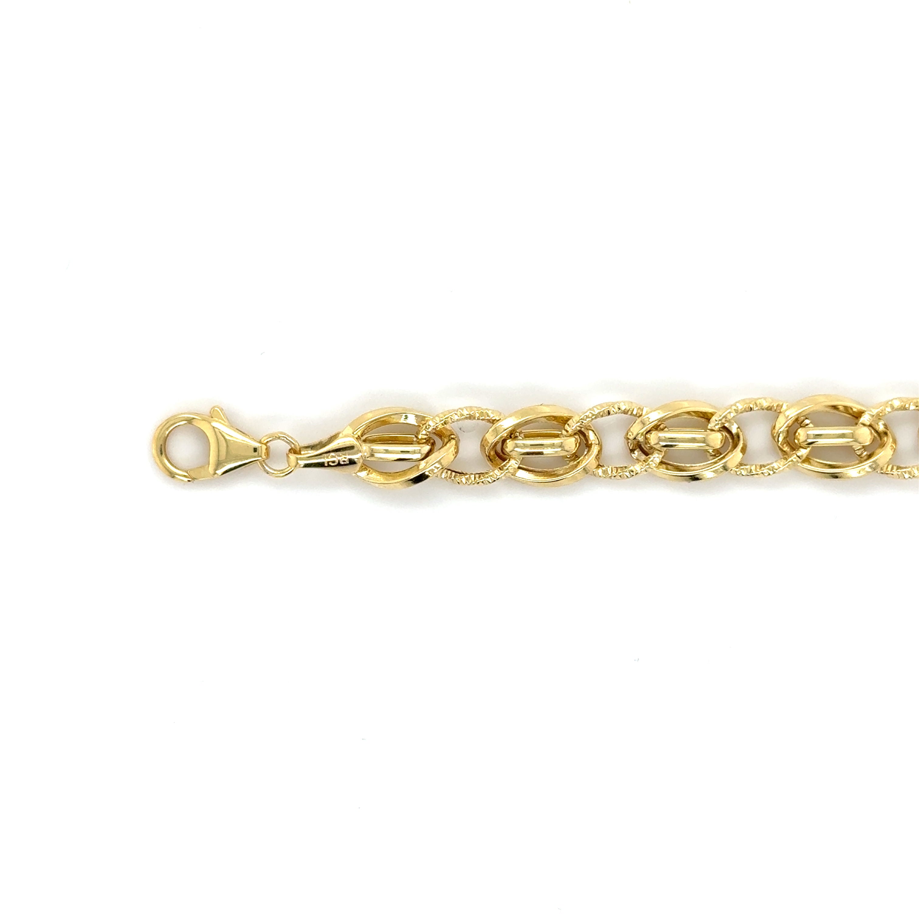 14K solid gold twisted oval link bracelet with polished, textured connectors, offering a bold yet elegant style. Durable and tarnish-resistant, this bracelet is perfect for everyday wear or evenings, and makes a thoughtful gift for birthdays, anniversaries, and milestone celebrations.