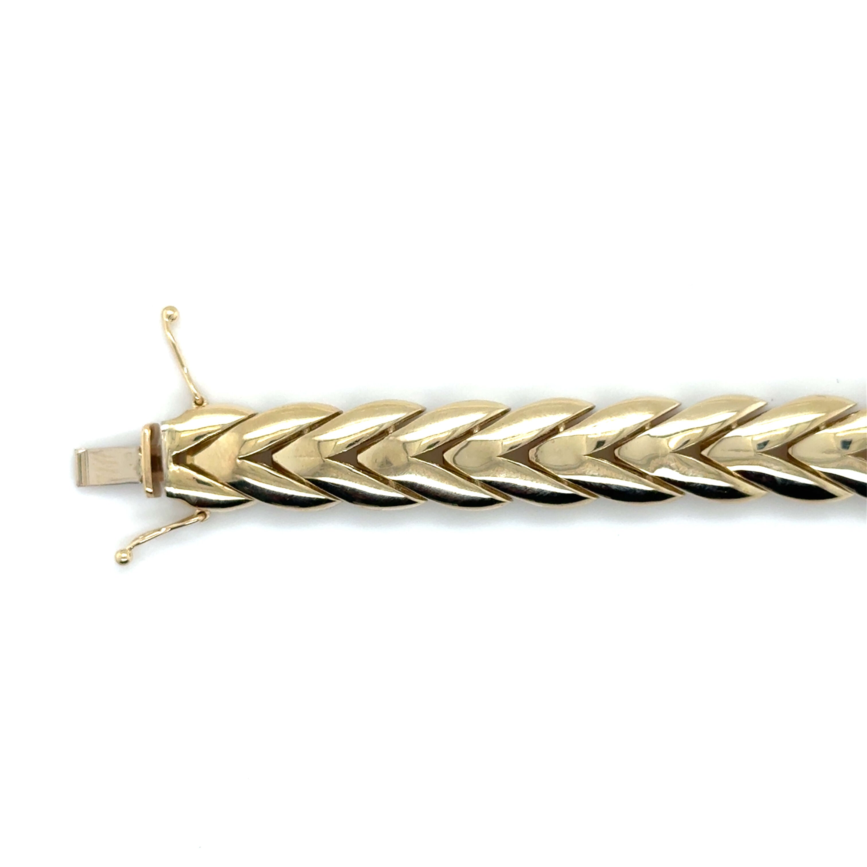 14K Gold Chevron Bracelet offers an eye-catching design, secure box clasp, and heavy shine, ideal for birthdays or luxurious layering