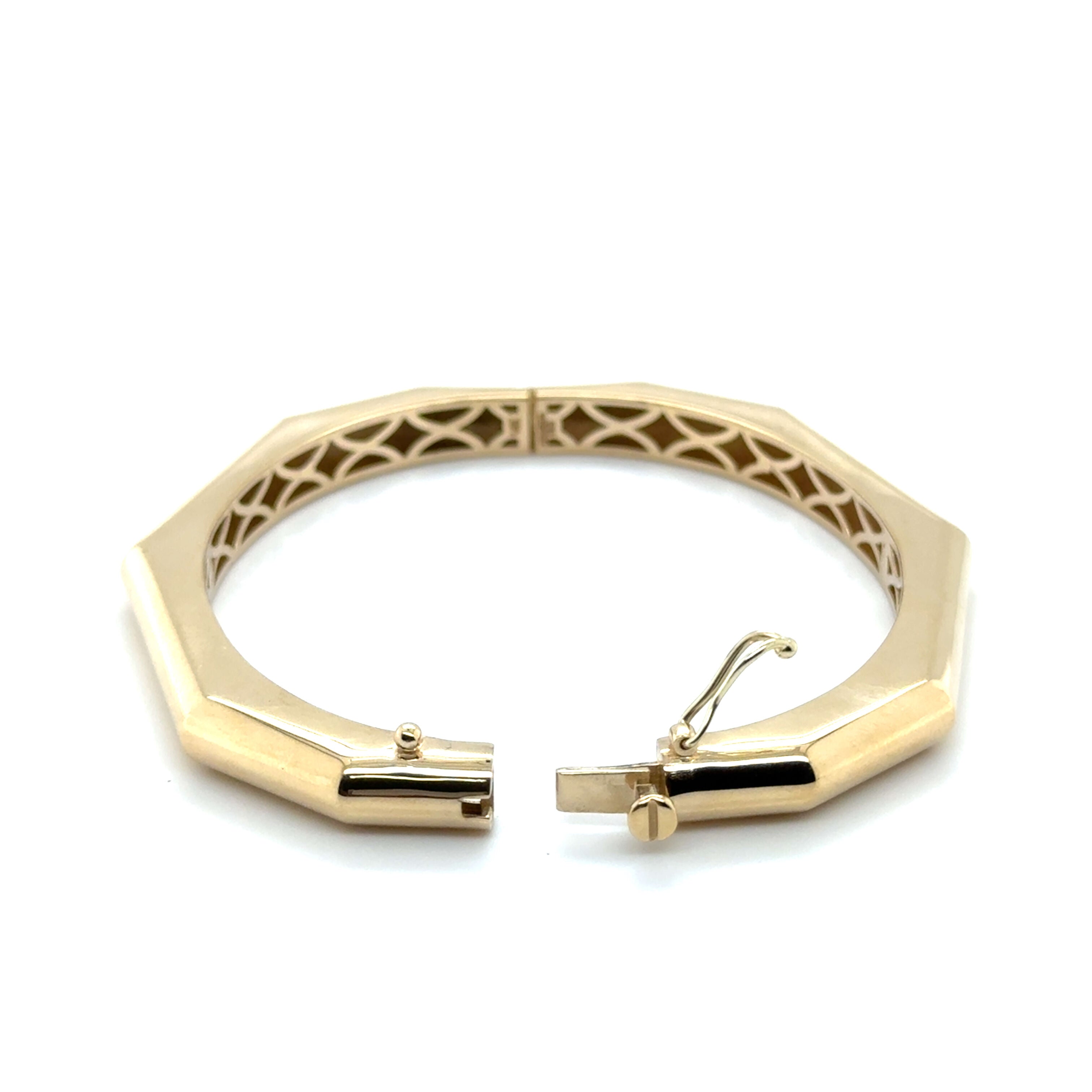 Sleek and wide 14K Yellow Gold Bangle with a polished finish that makes it perfect for stacking or solo wear, a luxury accessory for birthdays, Valentine’s Day, or promotions.
