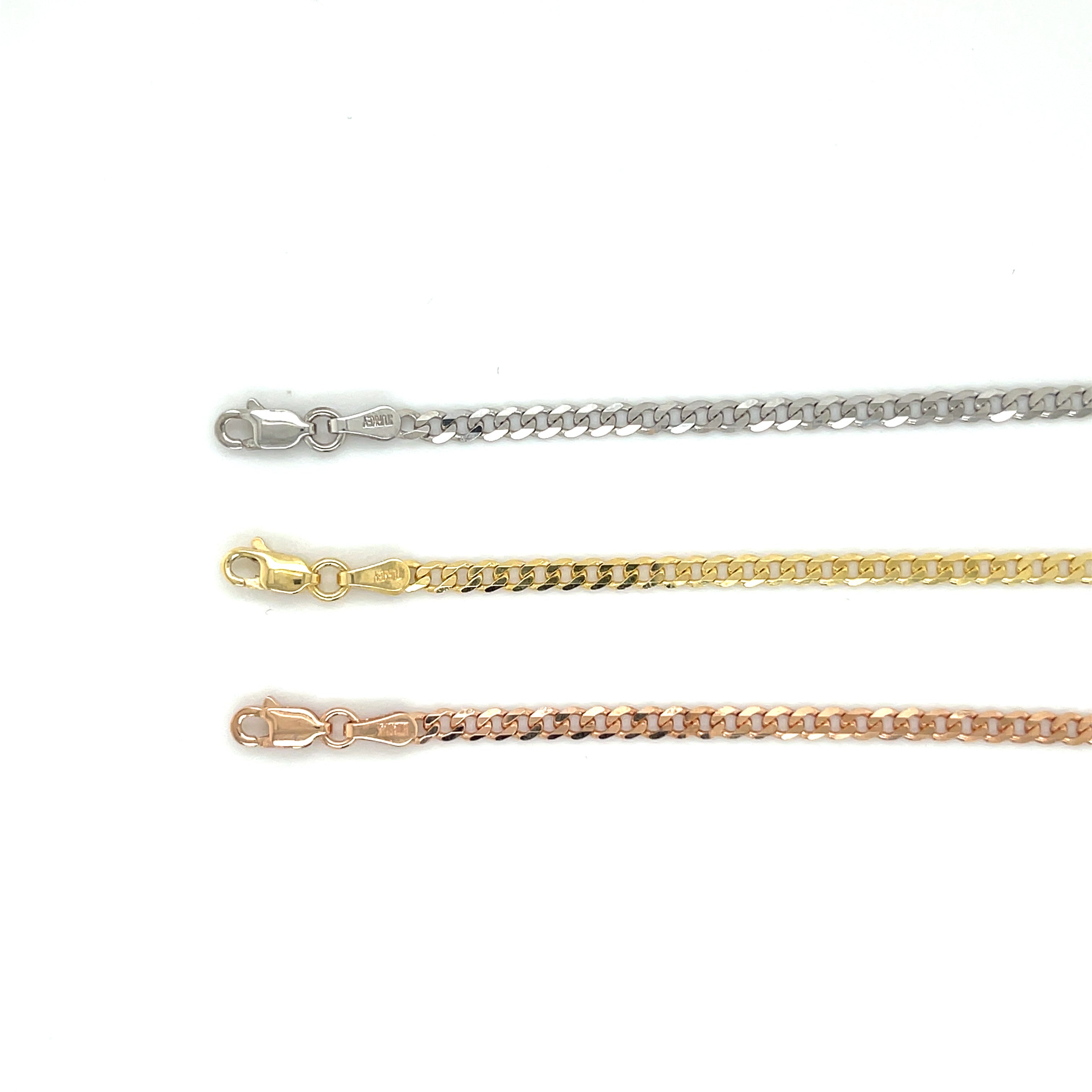 This 14K Gold Bracelet features a dainty curb chain and secure clasp, crafted for lasting shine and elevated everyday styling