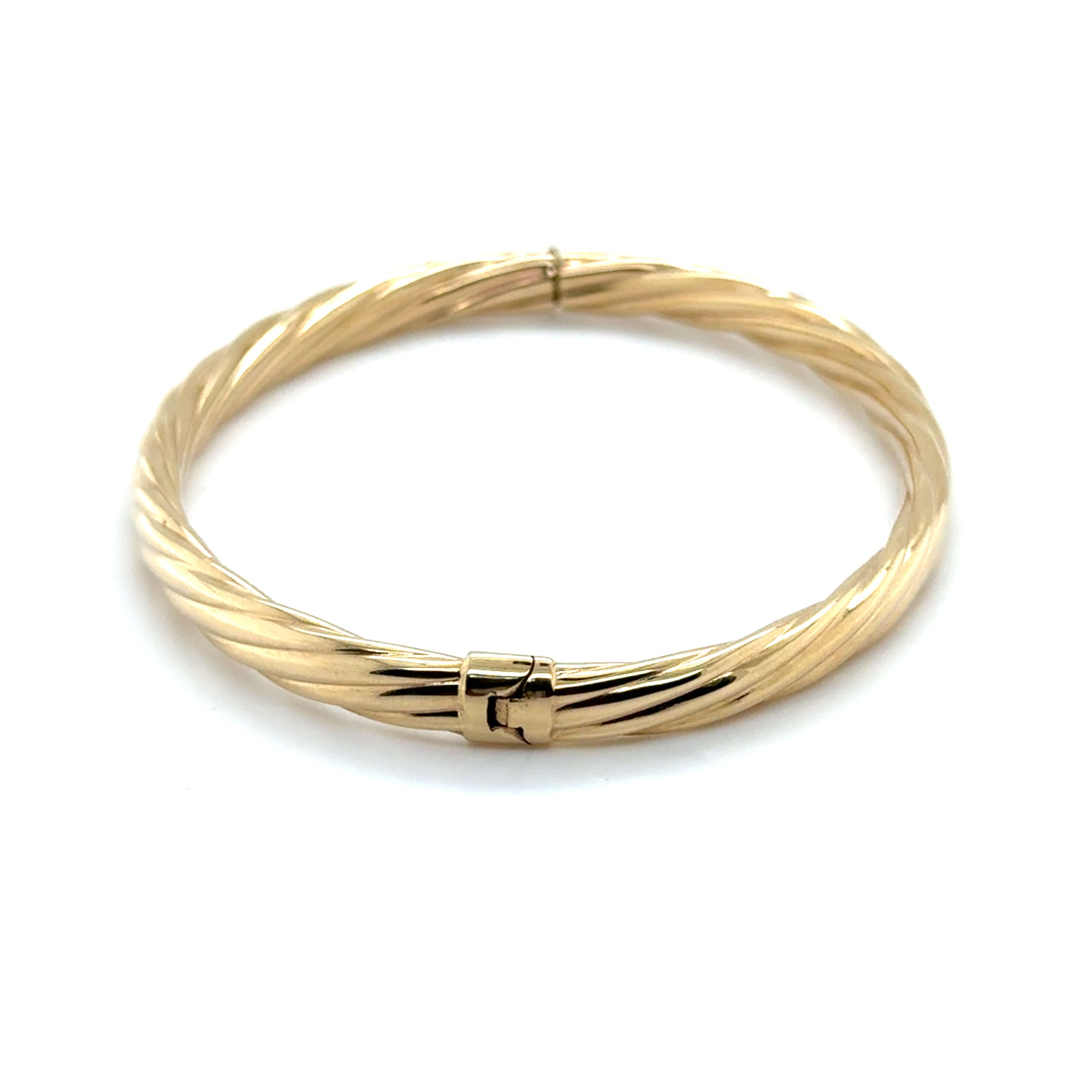 Open view of the 5mm thick 14K gold bangle bracelet, displaying hinge and twisted design craftsmanship.