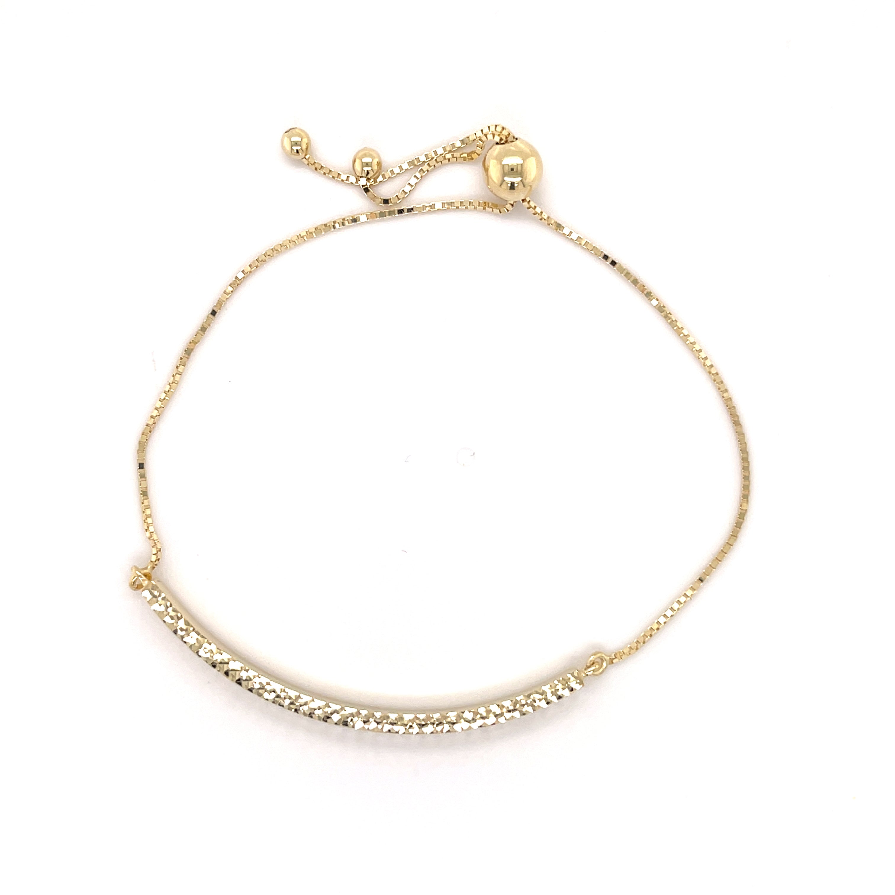 This lightweight 14K Gold Bracelet features a gently curved bar and box chain, crafted to sparkle daily and mark friendships with subtle sophistication