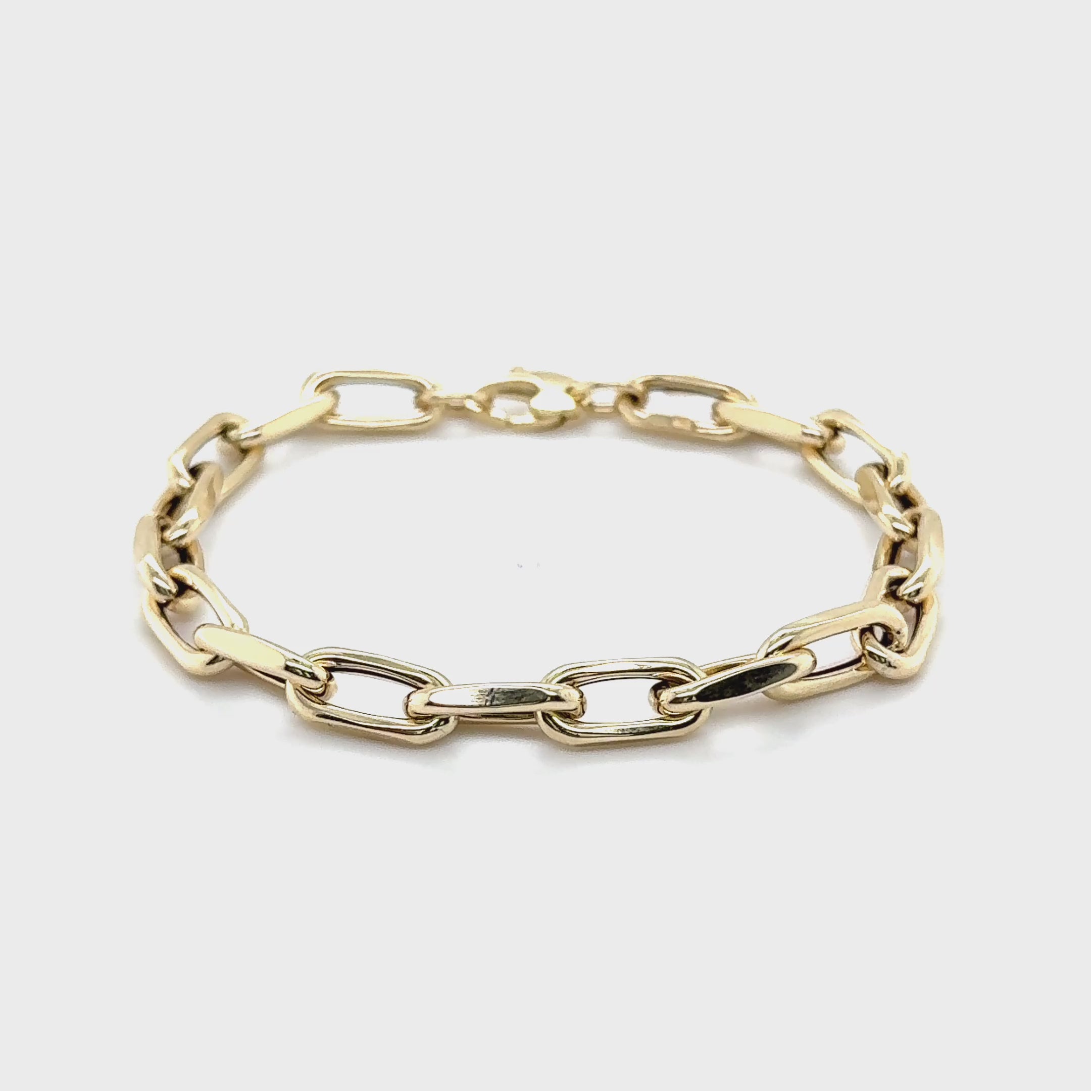 Elegant 14K yellow gold chunky 6mm faceted cable link bracelet with a lightweight hollow design, offering bold style and comfort. A versatile fine jewelry piece for birthdays, anniversaries, weddings, or everyday wear.