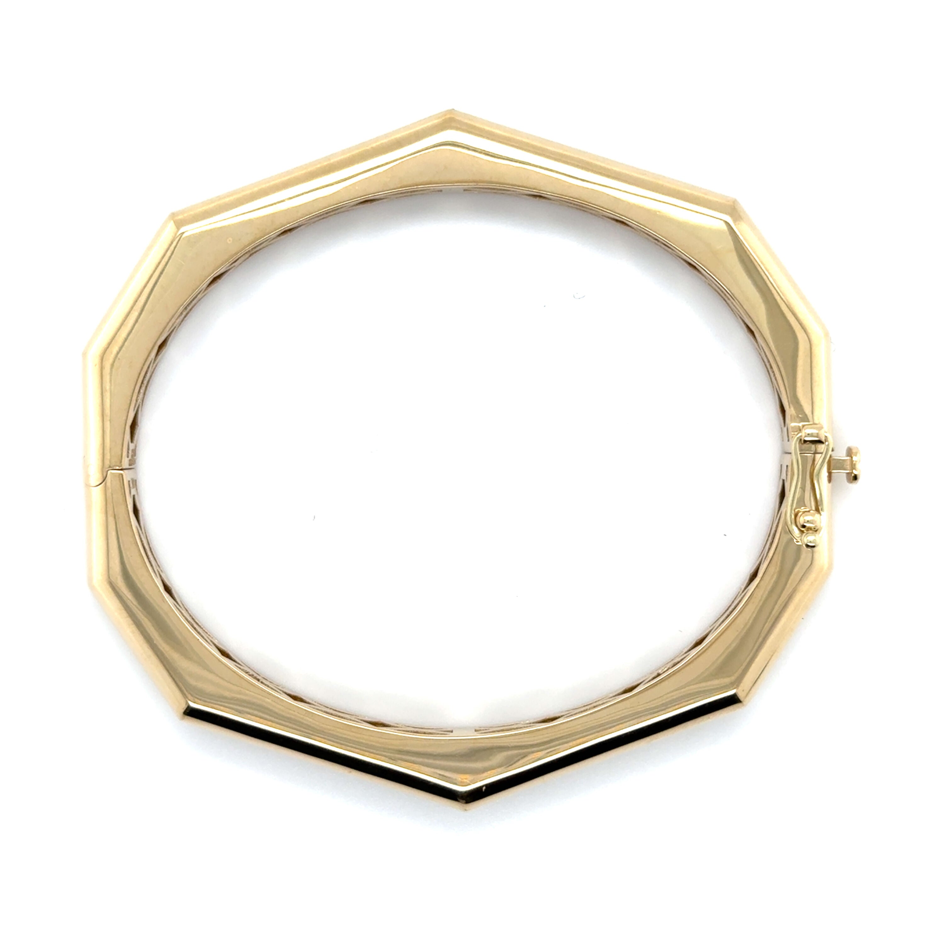 This geometric gold bracelet adds structure to your wristwear while offering lasting quality from solid 14K gold, ideal for gifting graduates or celebrating milestones.