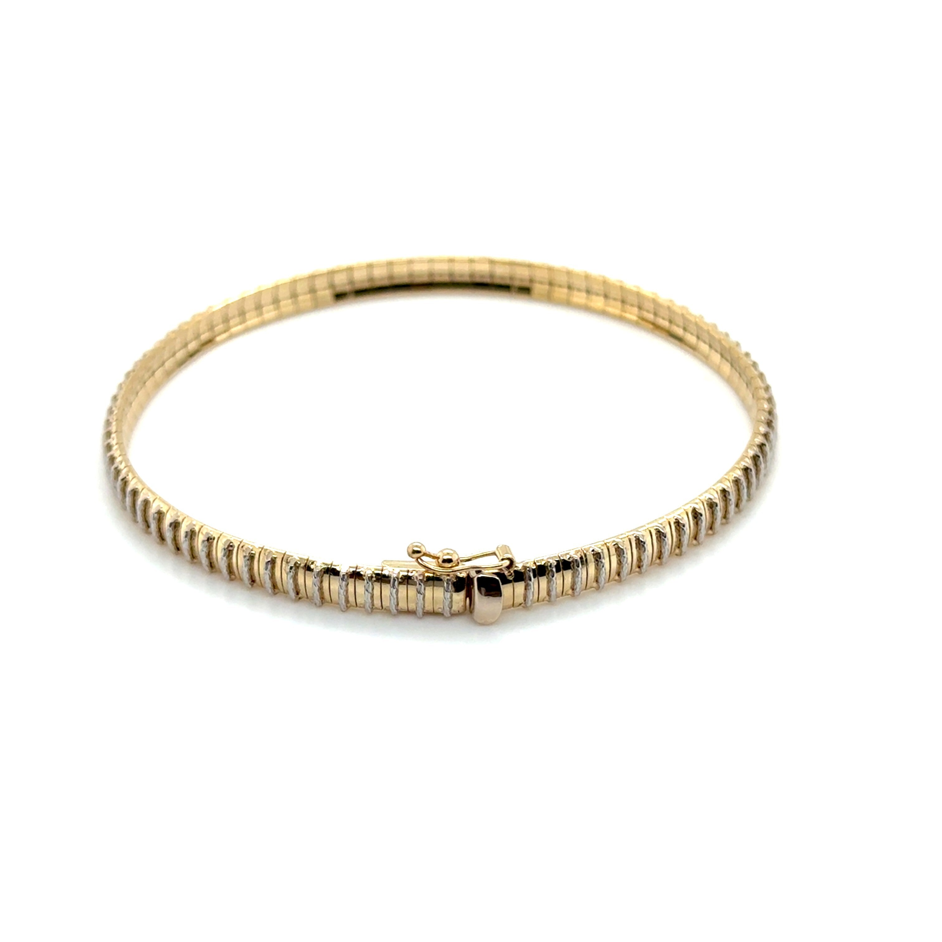 Two-tone gold bracelet with glittery finish perfect for sparkle and daily wear.