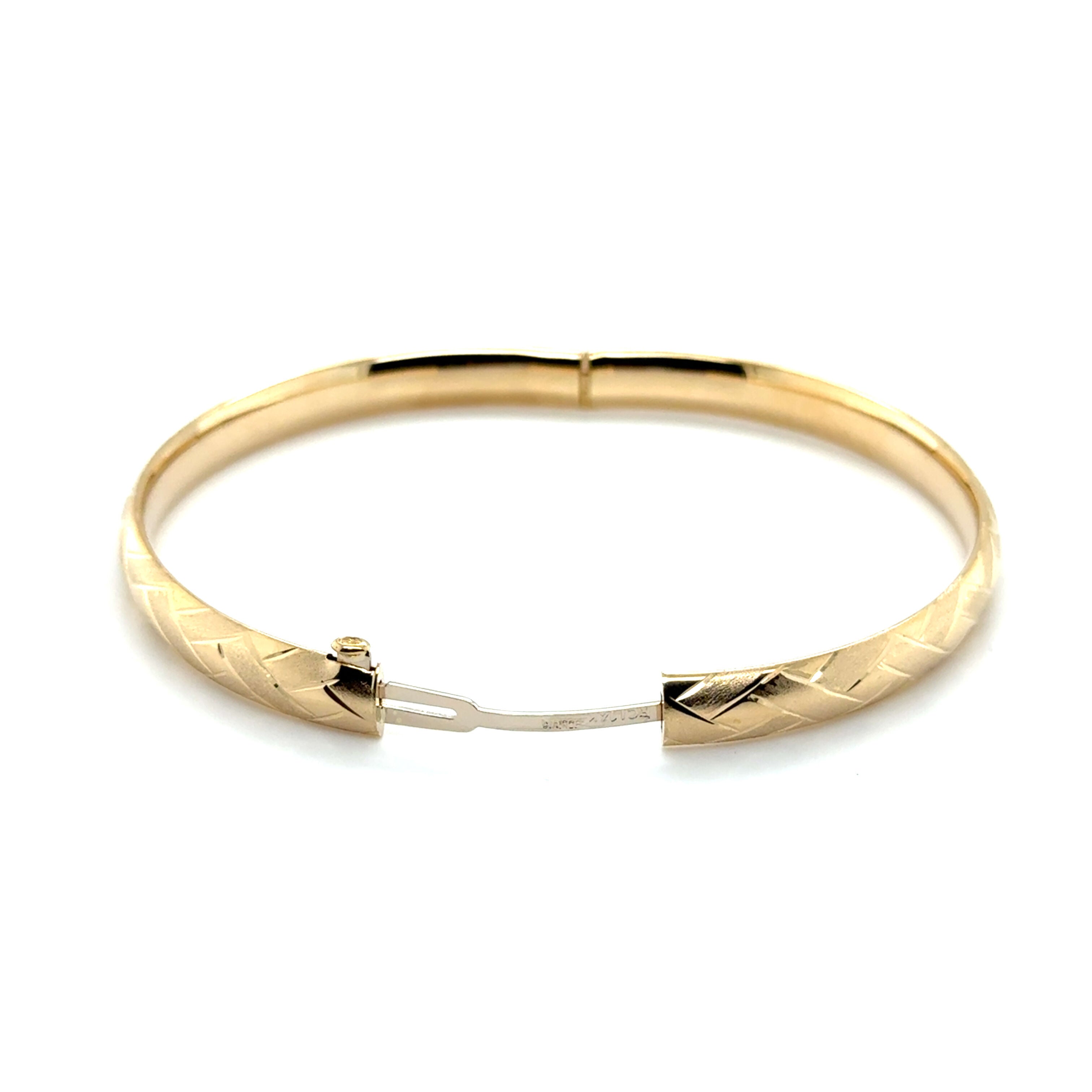 Textured 14K gold basketweave bracelet in a classic hinged style, offers anti-tarnish benefits and versatile gifting for birthdays or promotions