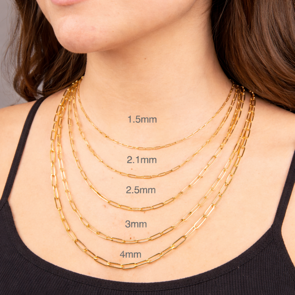 Gold chain paperclicp necklaces with Lobster Clasp of different thicknesses worn by a person