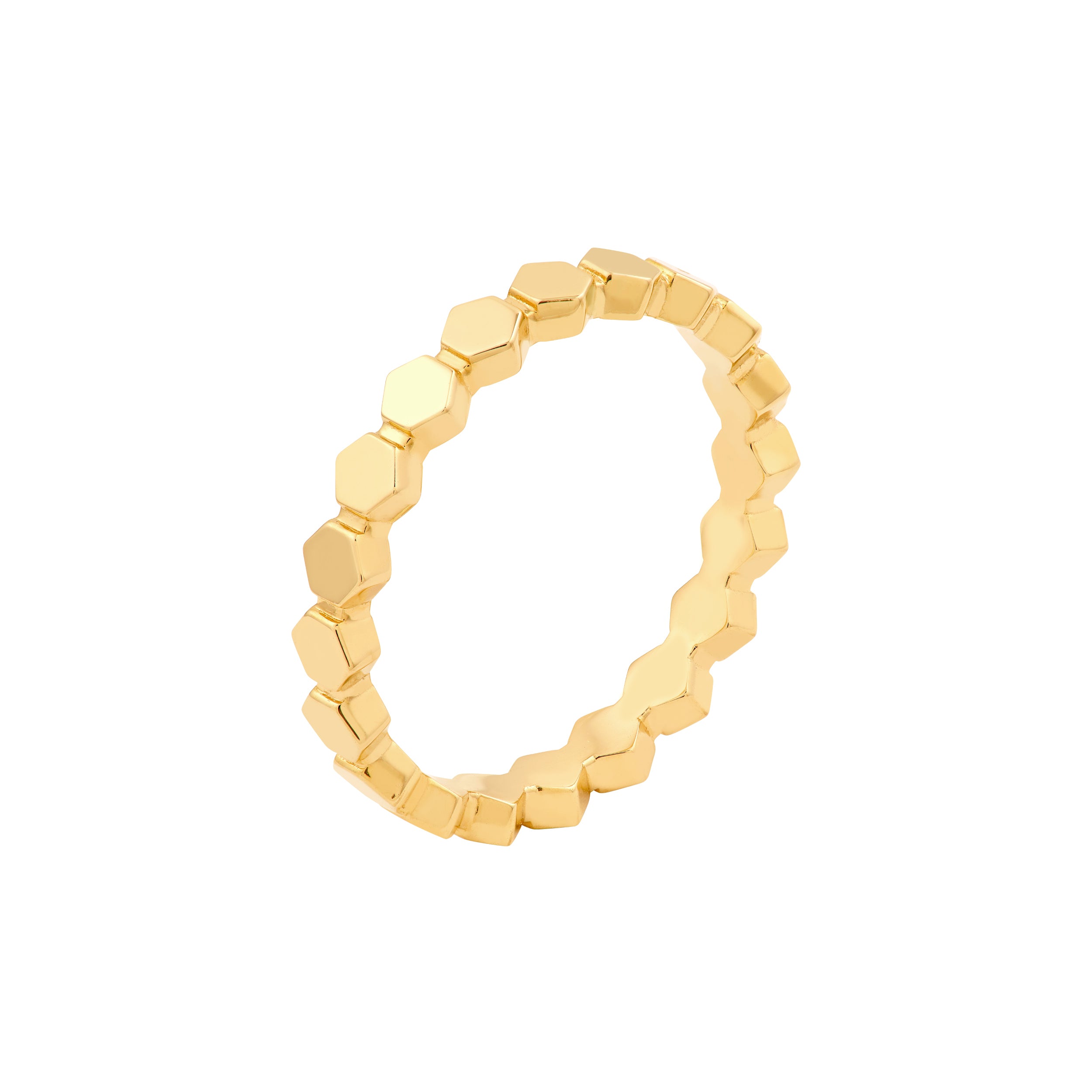Close-up view of 14K gold stackable band ring with modern hexagon pattern design