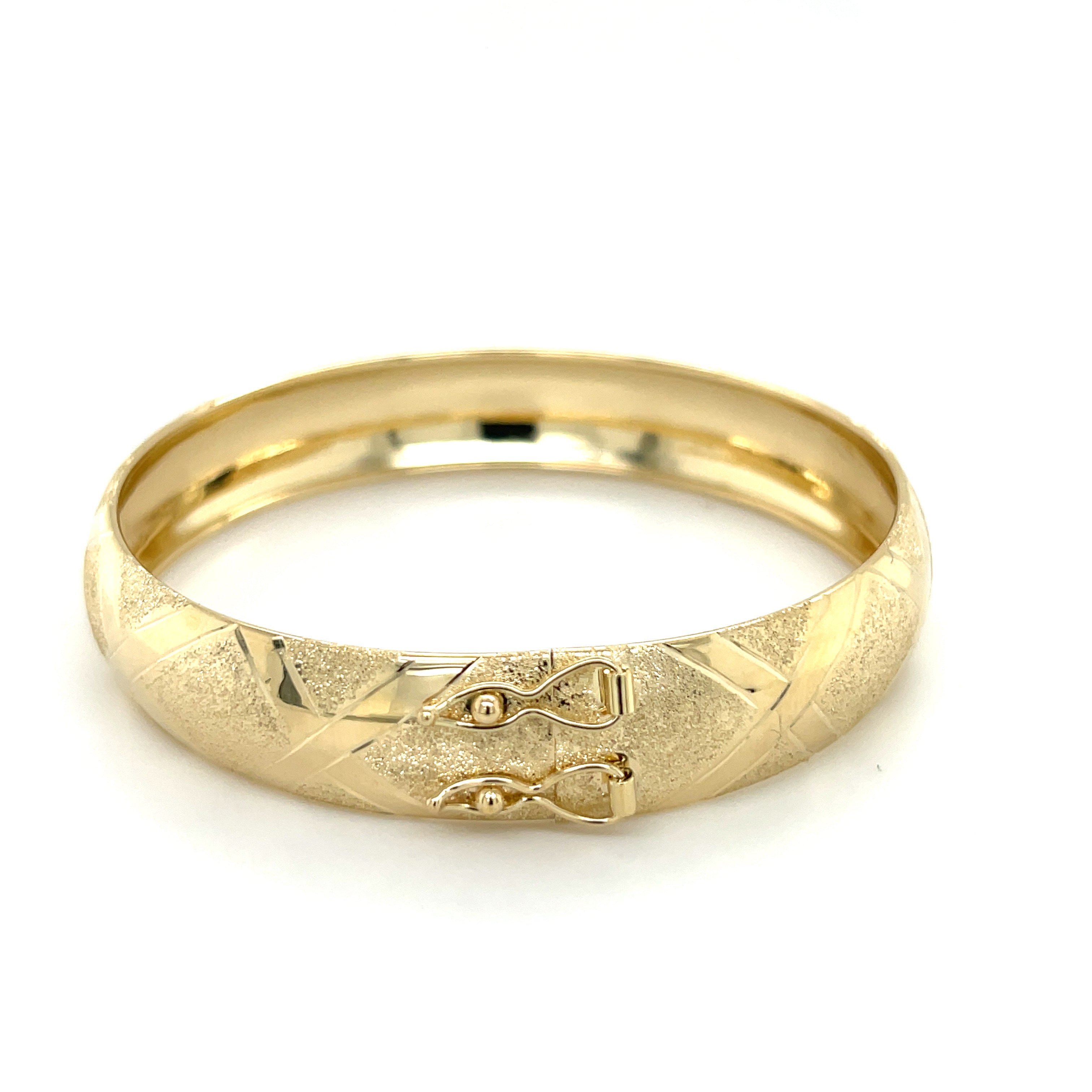 10K Gold Chunky Bangle: Polished And Textured X Pattern