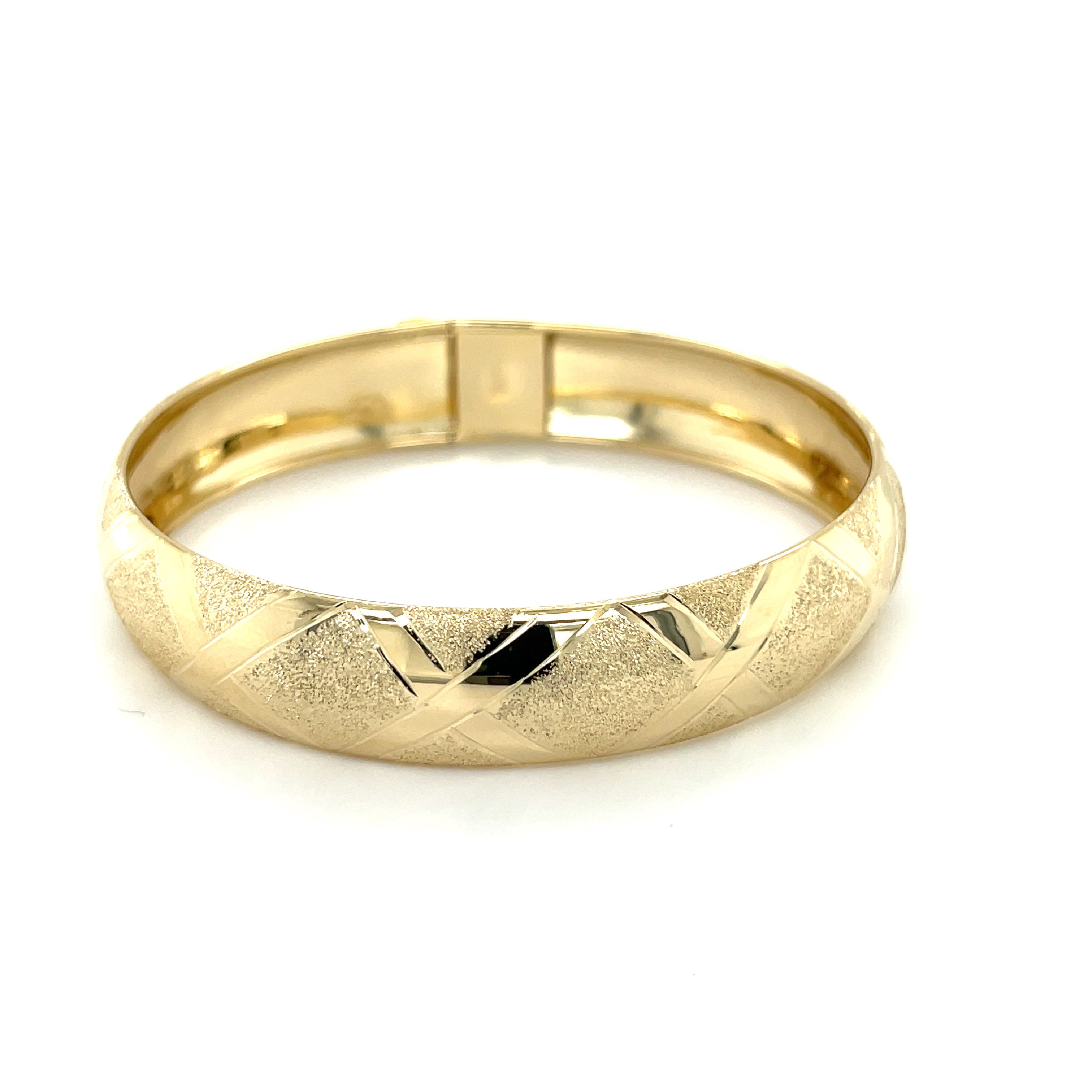Polished And Textured X Pattern Chunky Bangle