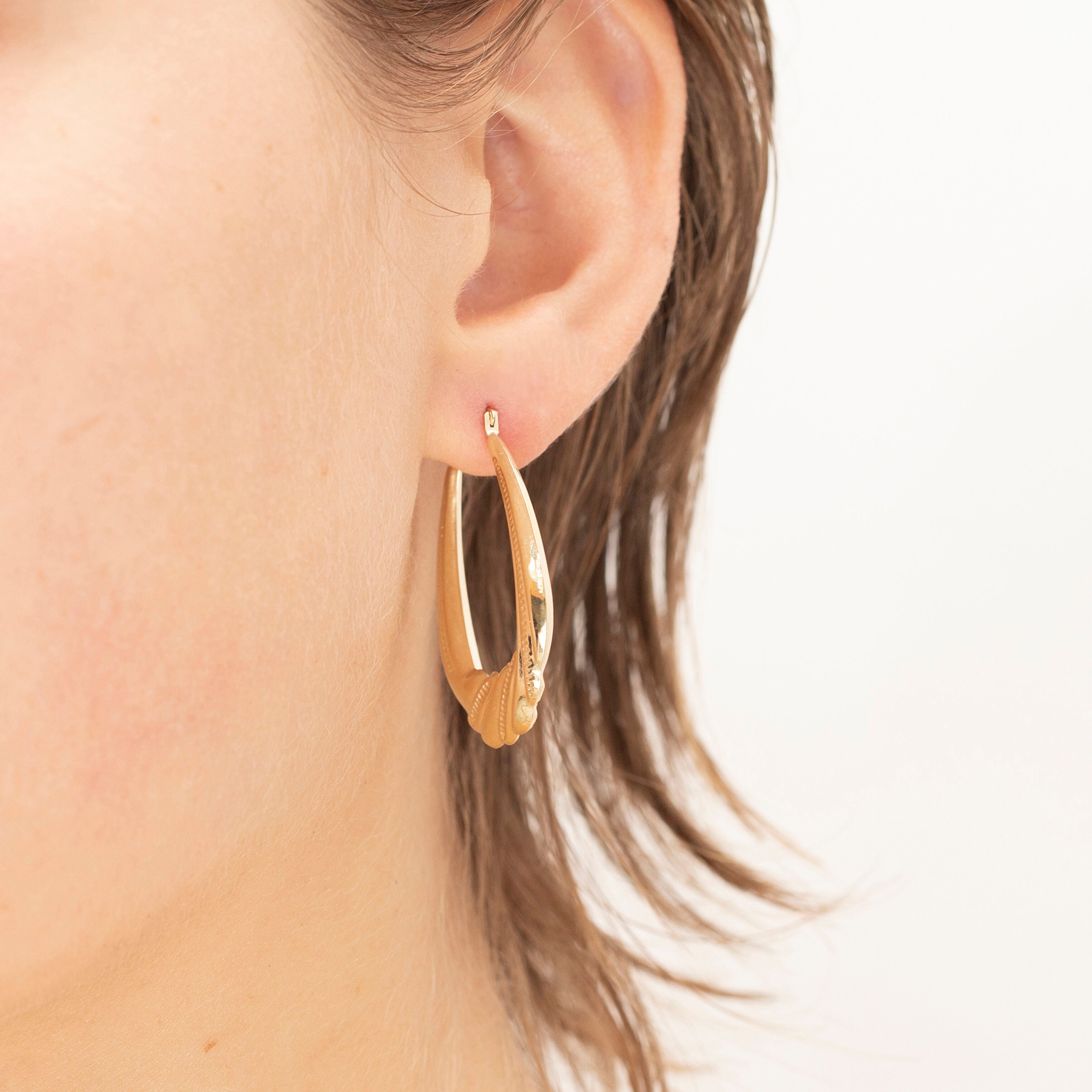 14K Gold Graduated Twist Oval Puffed Hoops