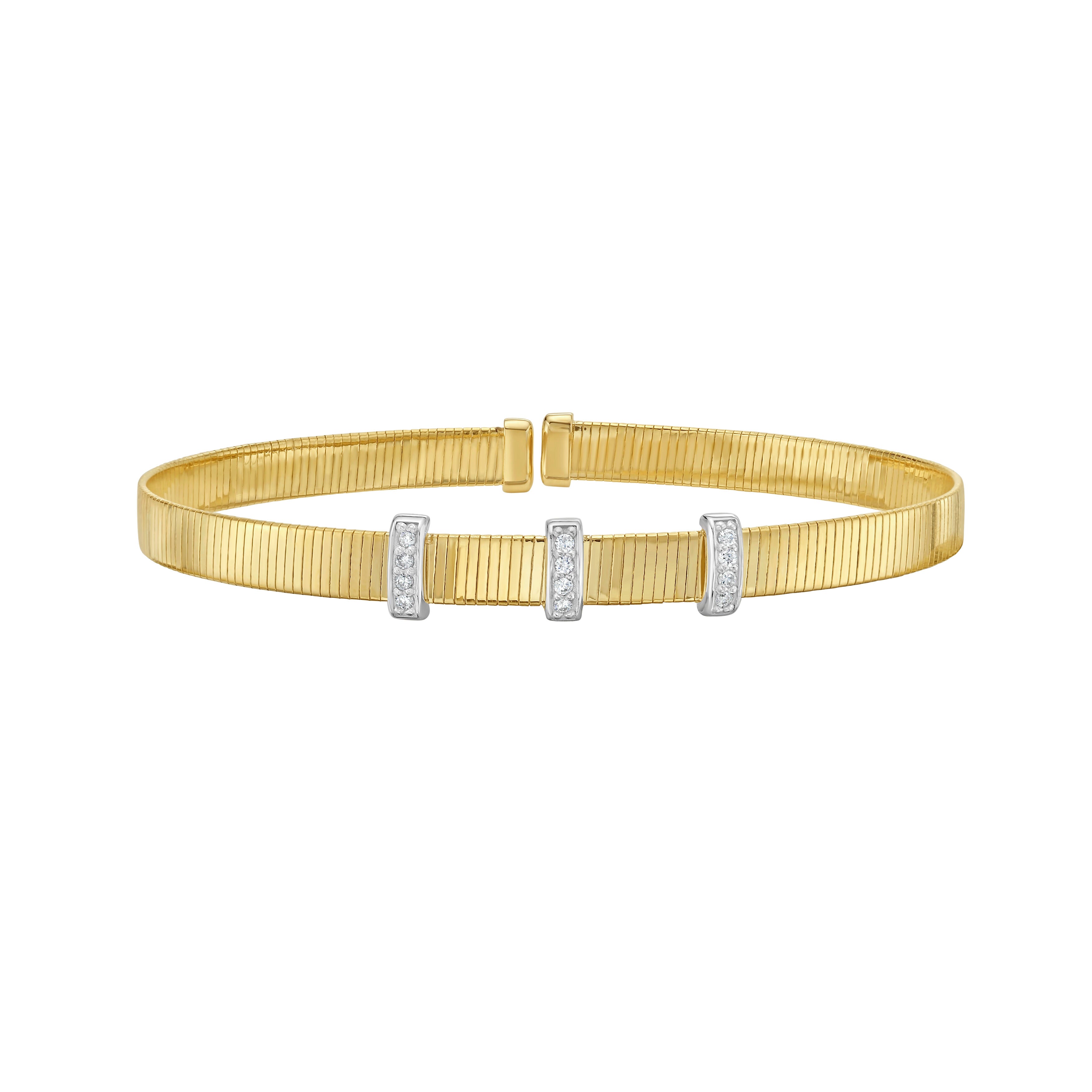 14K yellow gold cuff bangle featuring a diamond bar trio—three vertical bars, each set with round brilliant cut diamonds and framed in white gold for maximum brilliance