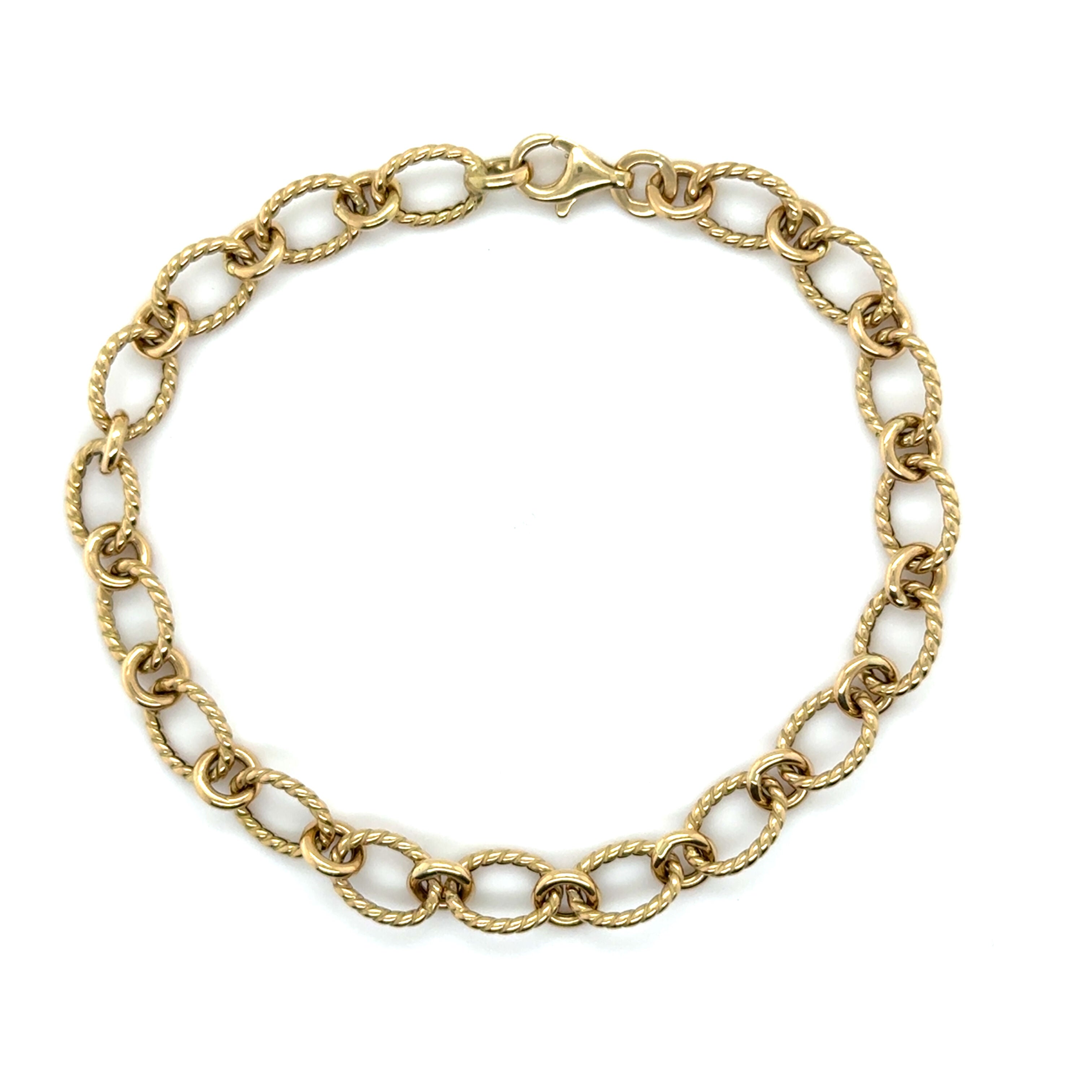 14K Gold Twisted Oval Link Chain Bracelet: 7"- Made In Italy