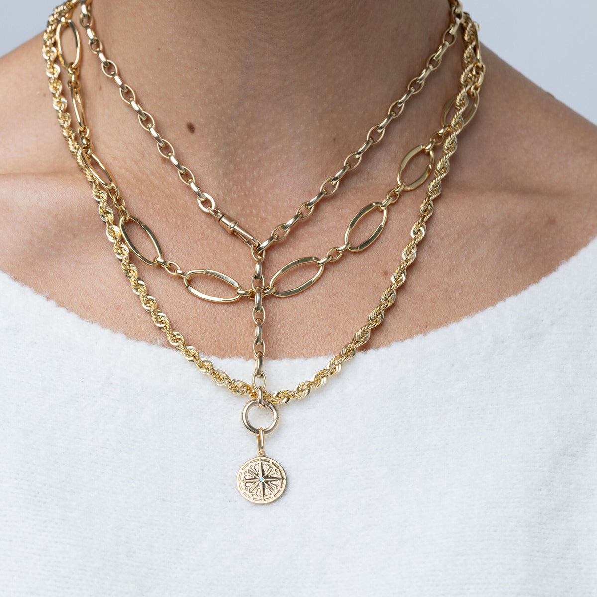 14K Yellow Gold Turquoise Compass Medallion Pendant attached to 14k gold charm holder necklace, made in Italy