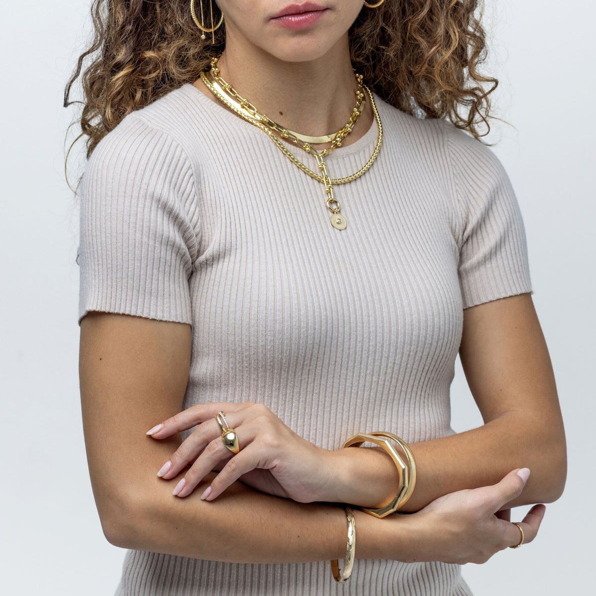 Close-up: 14K yellow gold U-link necklace, 5.5mm polished elongated links, rounded bead accents, 18-inch convertible Y chain, Herringbone necklace, wheat necklace