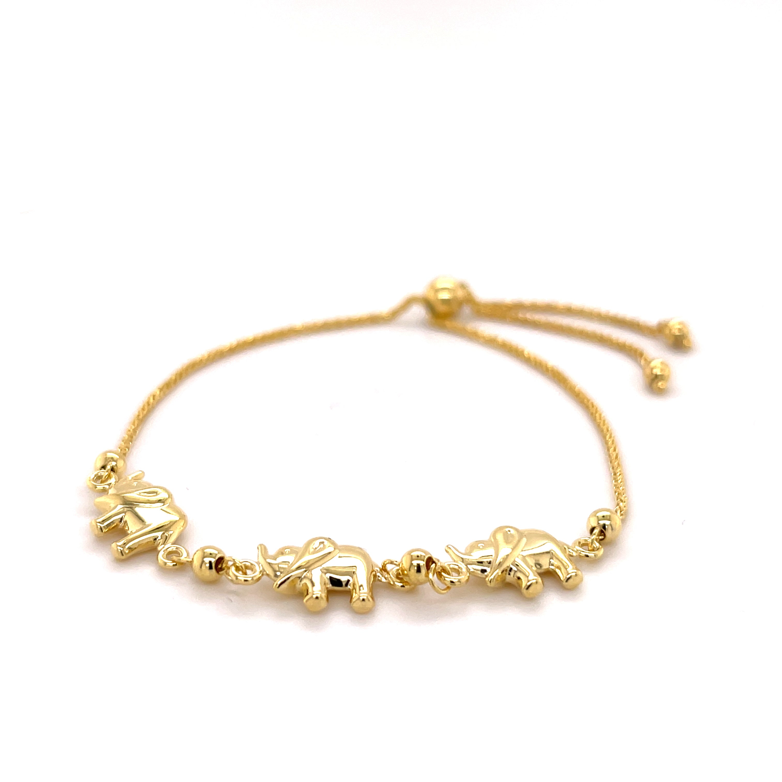 14K solid gold elephant charm friendship bracelet featuring three polished elephant charms on a dainty adjustable chain with a slide clasp. Durable, elegant, and versatile, this fine jewelry piece makes a thoughtful gift for birthdays, anniversaries, or everyday wear.
