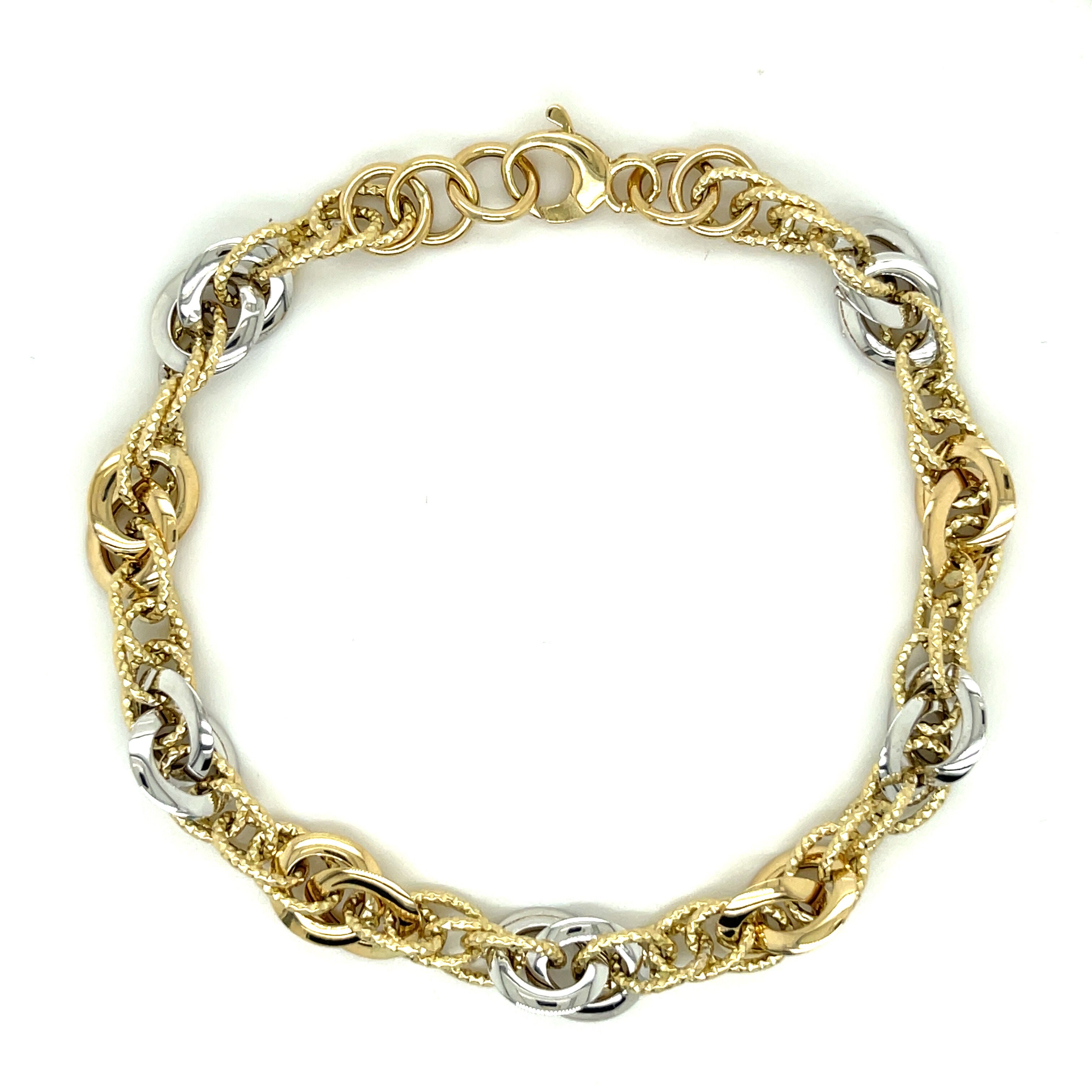 Elegant 14K Two-Tone Gold Bracelet featuring interlocking links for a unique look that combines style and durability, perfect for everyday wear or gifting.