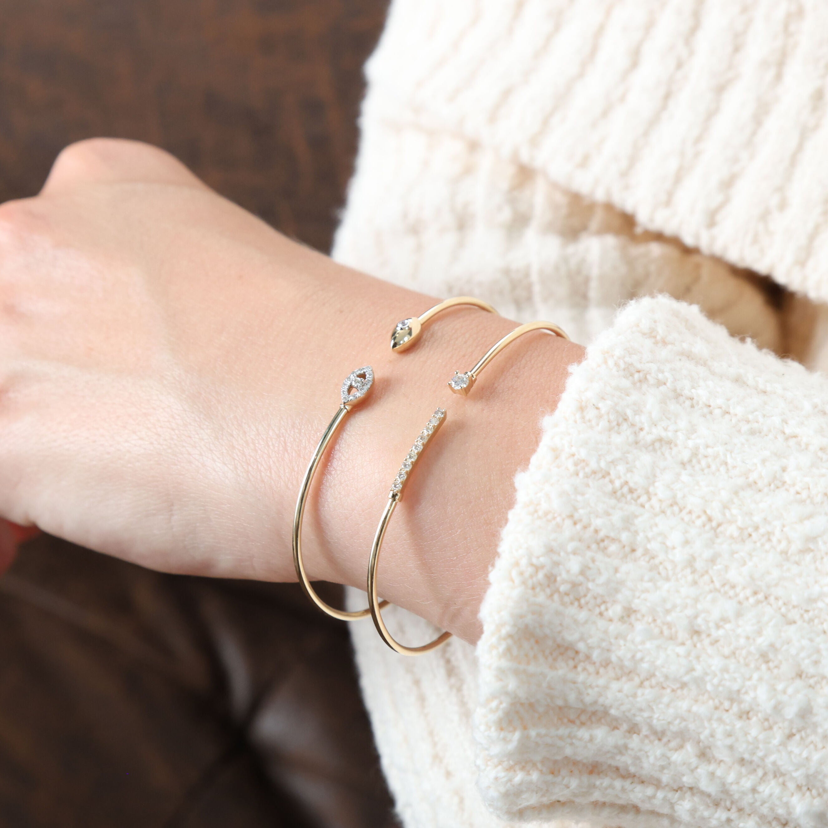 Worn with a sophisticated white blouse, this Elegant Diamond Cuff Bangle creates a polished, high-end look with its diamond detailing. Ideal for a business meeting or formal occasion, it brings understated elegance to any ensemble.
