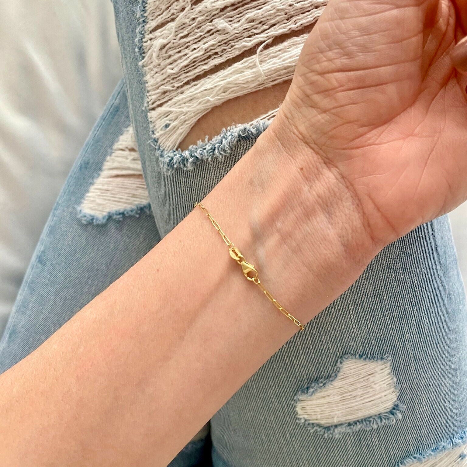Elegant dainty 14K gold bracelet featuring a real Citrine gemstone, worn on the wrist in natural light to highlight the November birthstone’s golden brilliance. A meaningful jewelry choice that inspires confidence and optimism for birthdays, milestone events, and everyday wear.