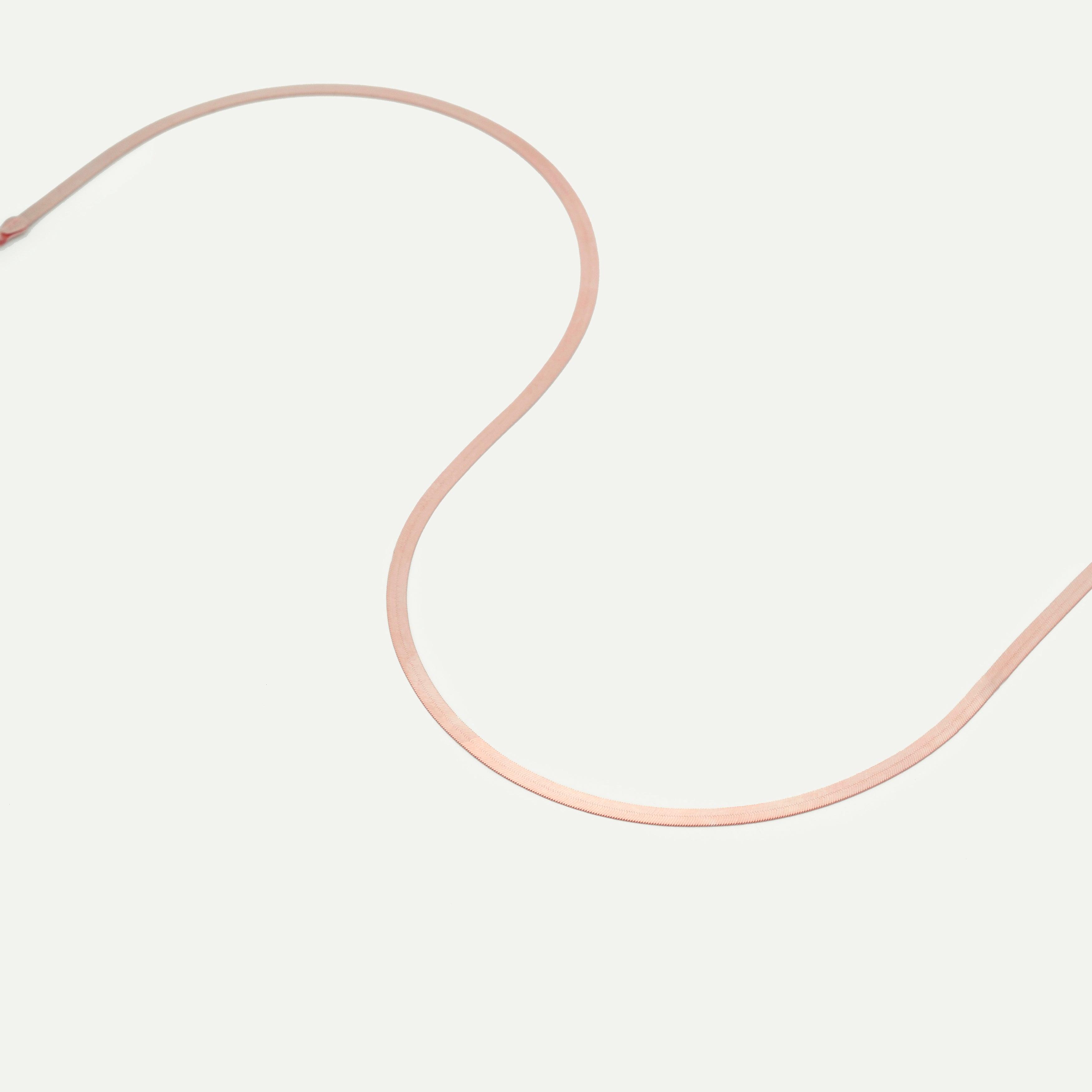 14K Solid Rose Gold Herringbone Necklace with a sleek flat-link design and polished finish, offering a timeless and elegant look. This durable and comfortable solid gold necklace is versatile for daily wear or layering and makes a thoughtful gift for birthdays, anniversaries, weddings, and milestone celebrations.