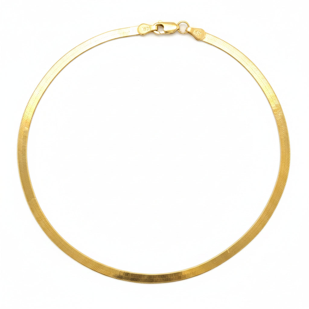 14k solid gold 3mm wide herringbone anklet with lobster clasp on white background