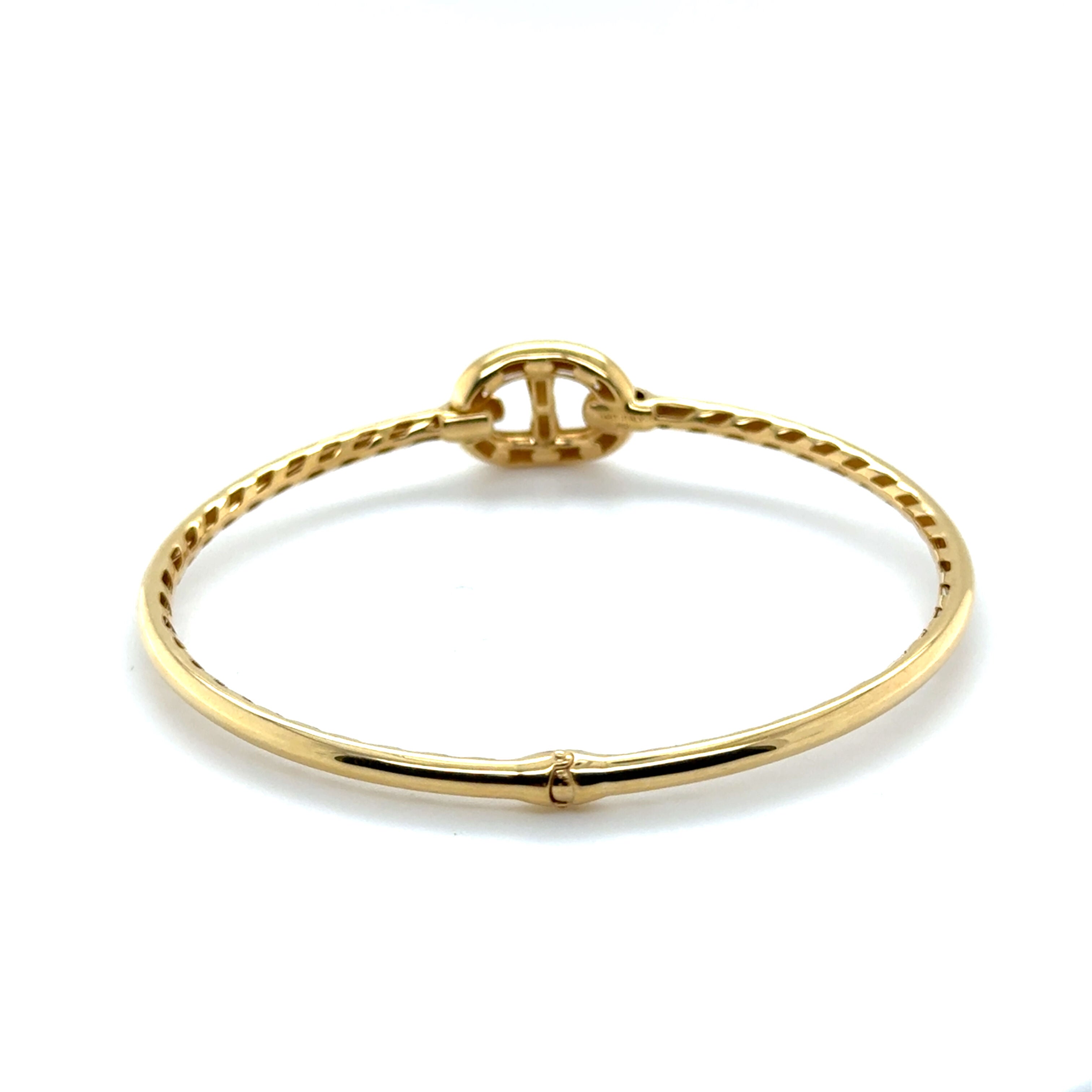 A sleek 14K yellow gold mariner link bangle bracelet featuring a polished 15mm x 12mm mariner link centerpiece. Minimalist yet bold, this real gold bracelet is durable, tarnish resistant, and secured with a snap-lock clasp. A versatile and timeless jewelry gift for birthdays, anniversaries, and milestone celebrations, perfect for everyday wear or special occasions.