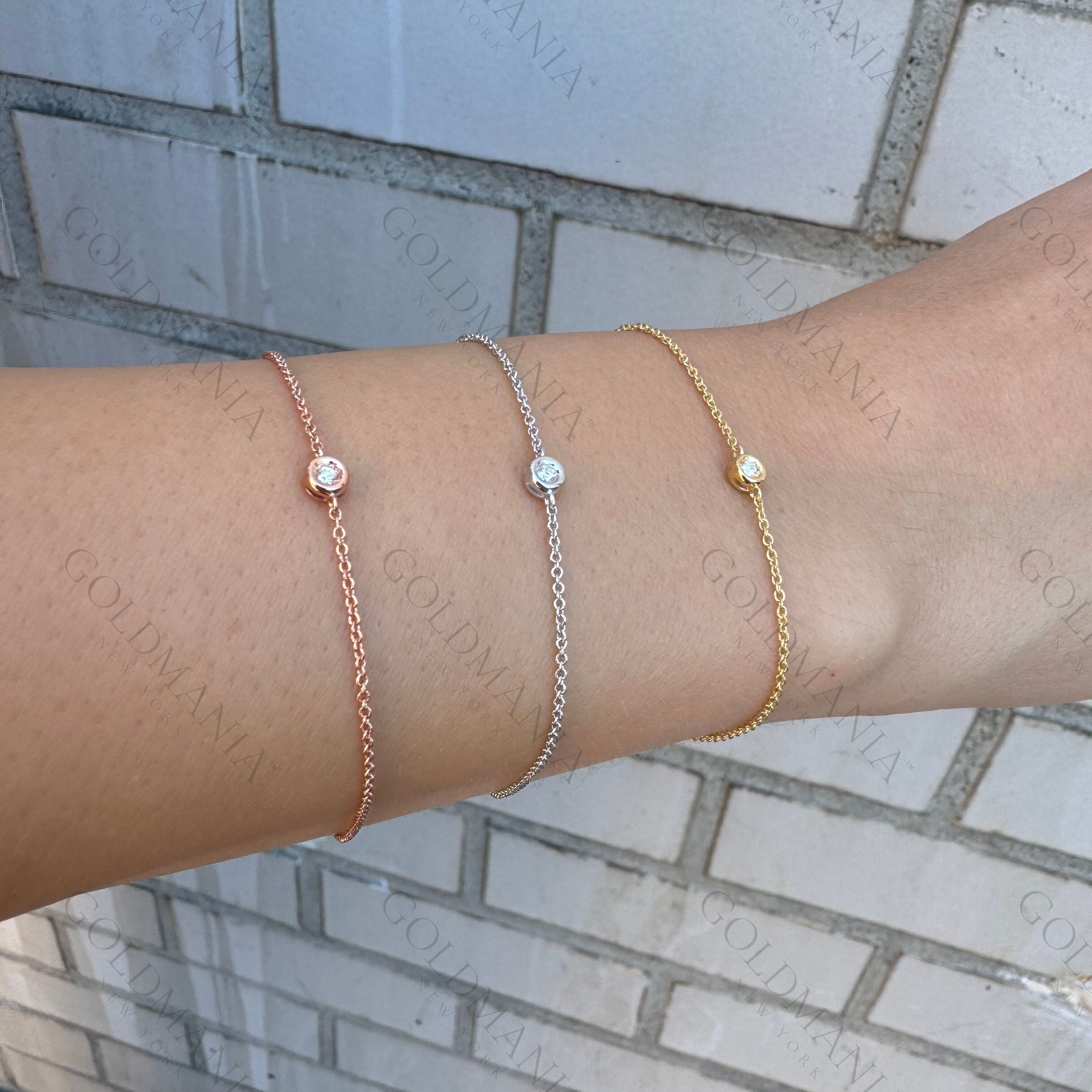 Diamond Bezel Bracelet in 14K white gold styled with a simple white tee and cardigan, a minimalist jewelry choice that enhances calmness and sophistication, perfect for casual Fridays and everyday luxury.
